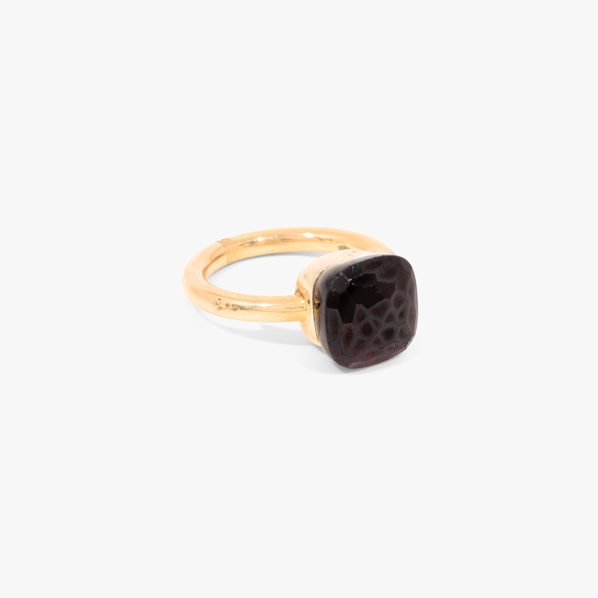 "Nudo" - Pomellato ring, made of gold, decorated with garnet