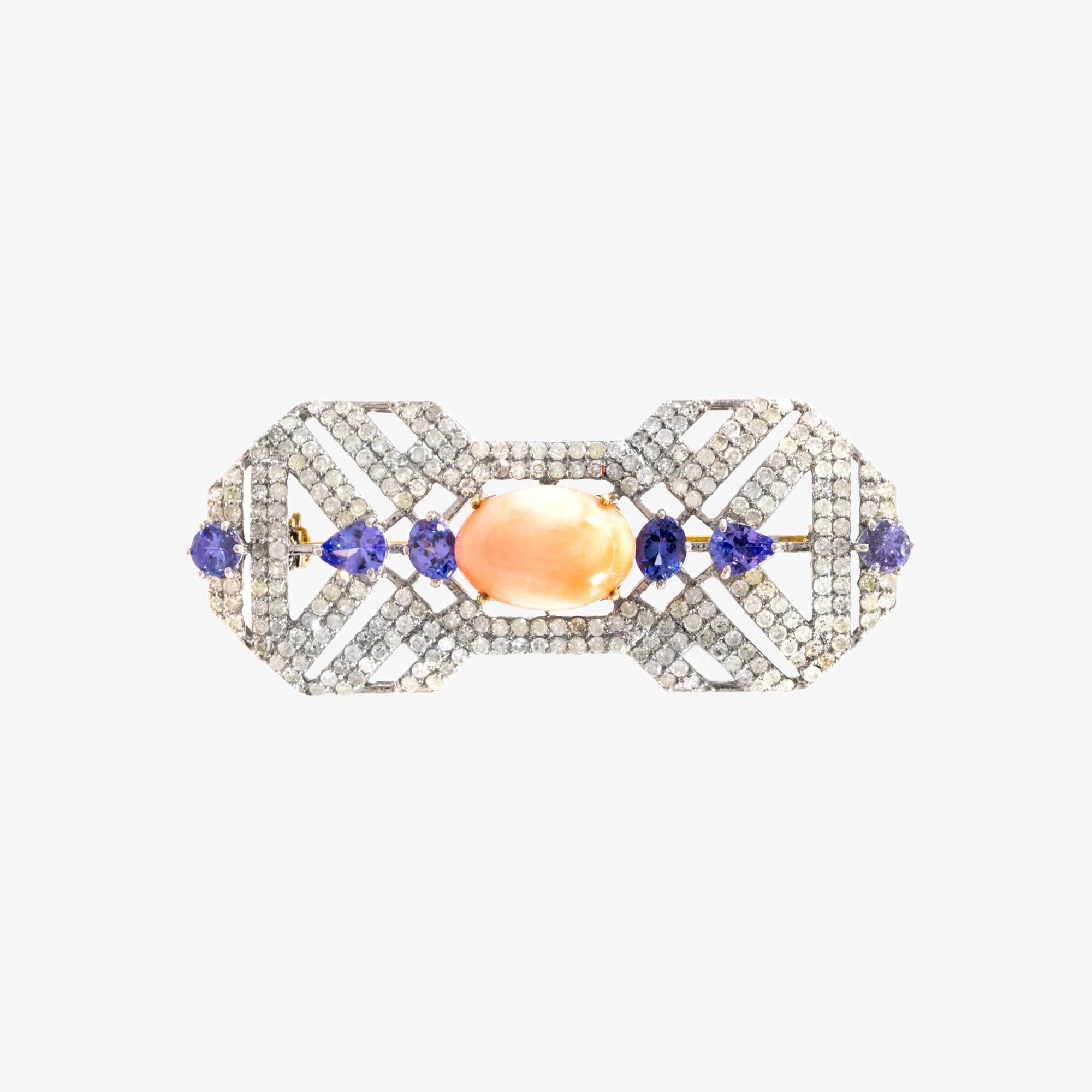 Art Deco style brooch in silver, decorated with a diamond, tanzanite and coral pavement