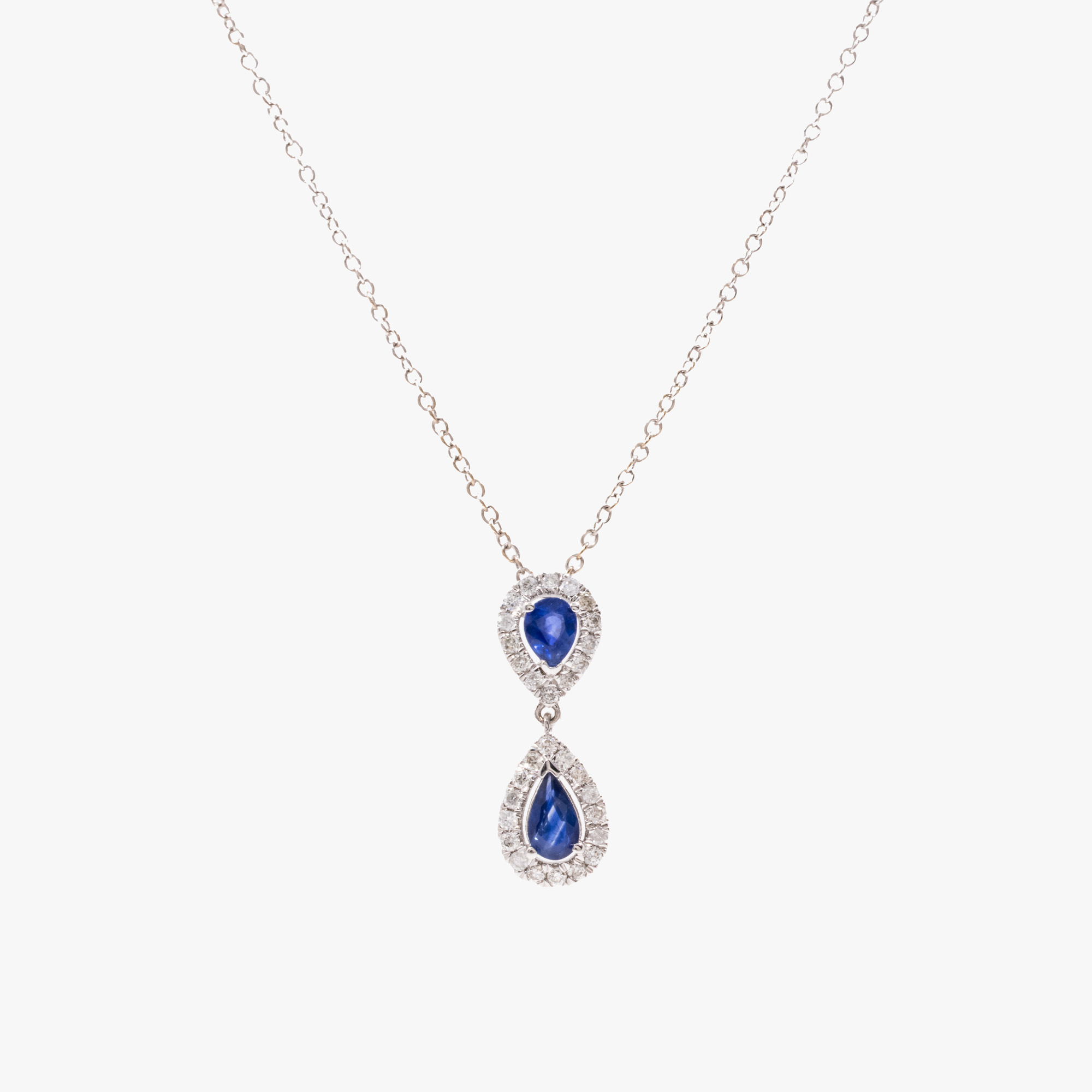 White gold chain with sapphire and diamond pendant, accompanied by additional gemological certificate