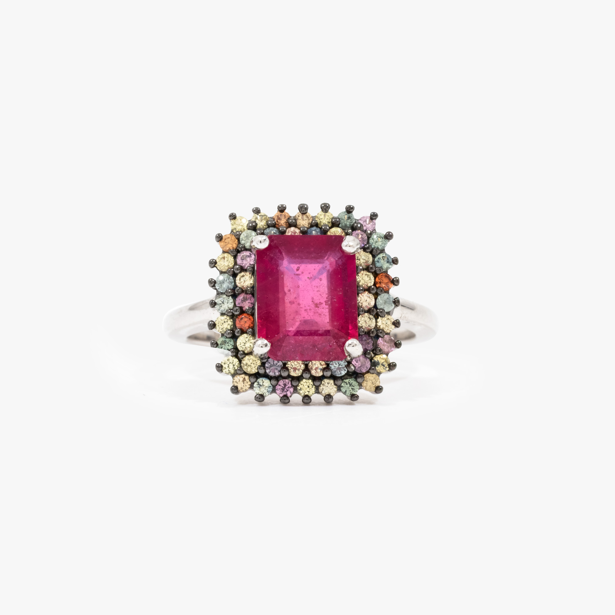 Silver ring, decorated with a central ruby and sapphires