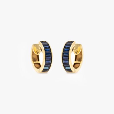 Pair of gold earrings decorated with sapphires