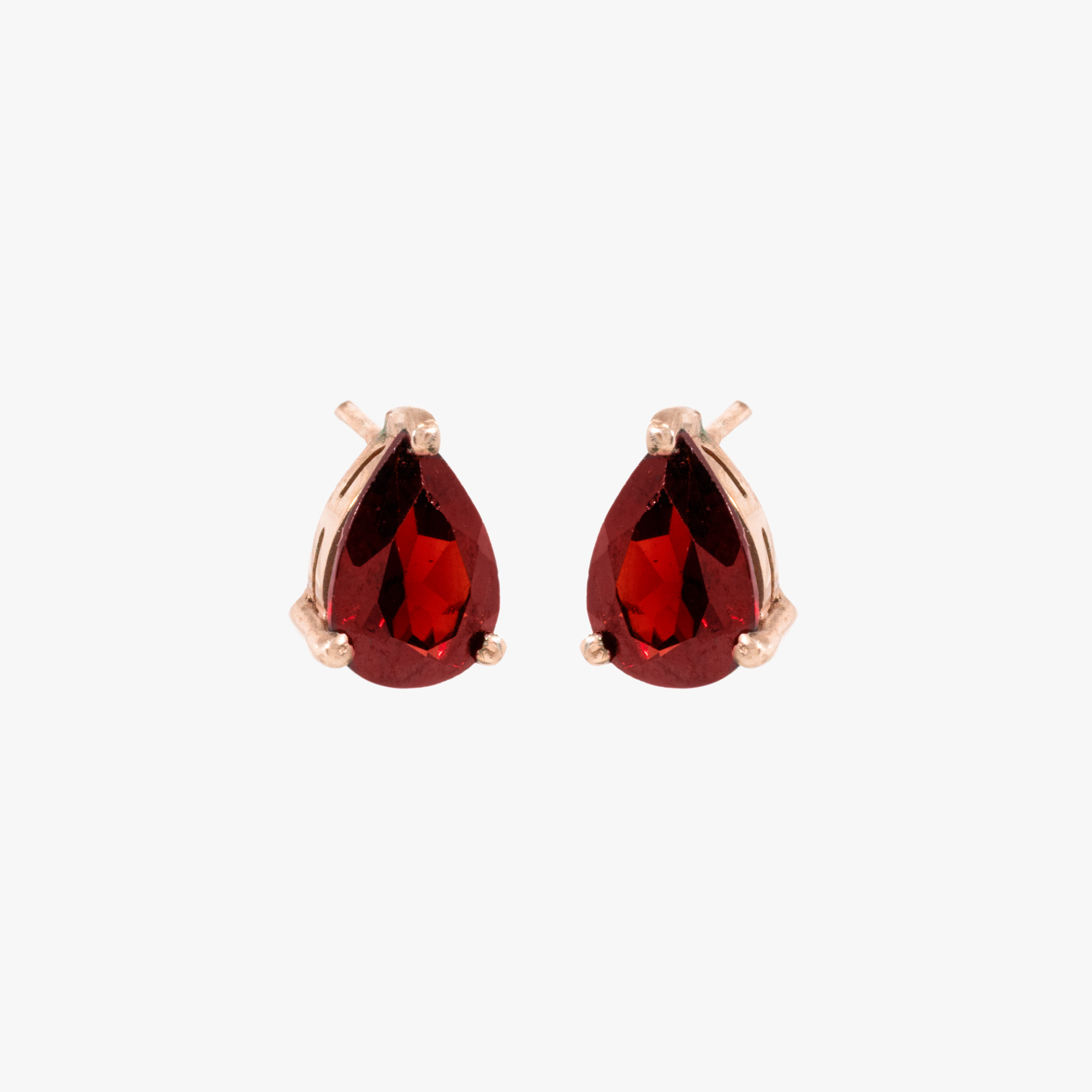 Pair of gilded silver earrings, decorated with garnets