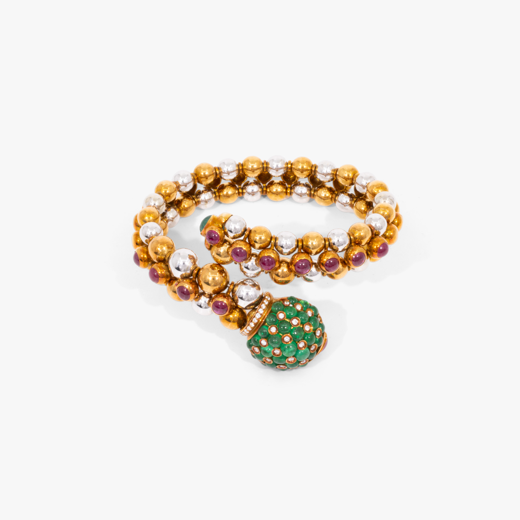Bicolor gold bracelet, decorated with emeralds, rubies and diamonds, accompanied by additional gemological certificate