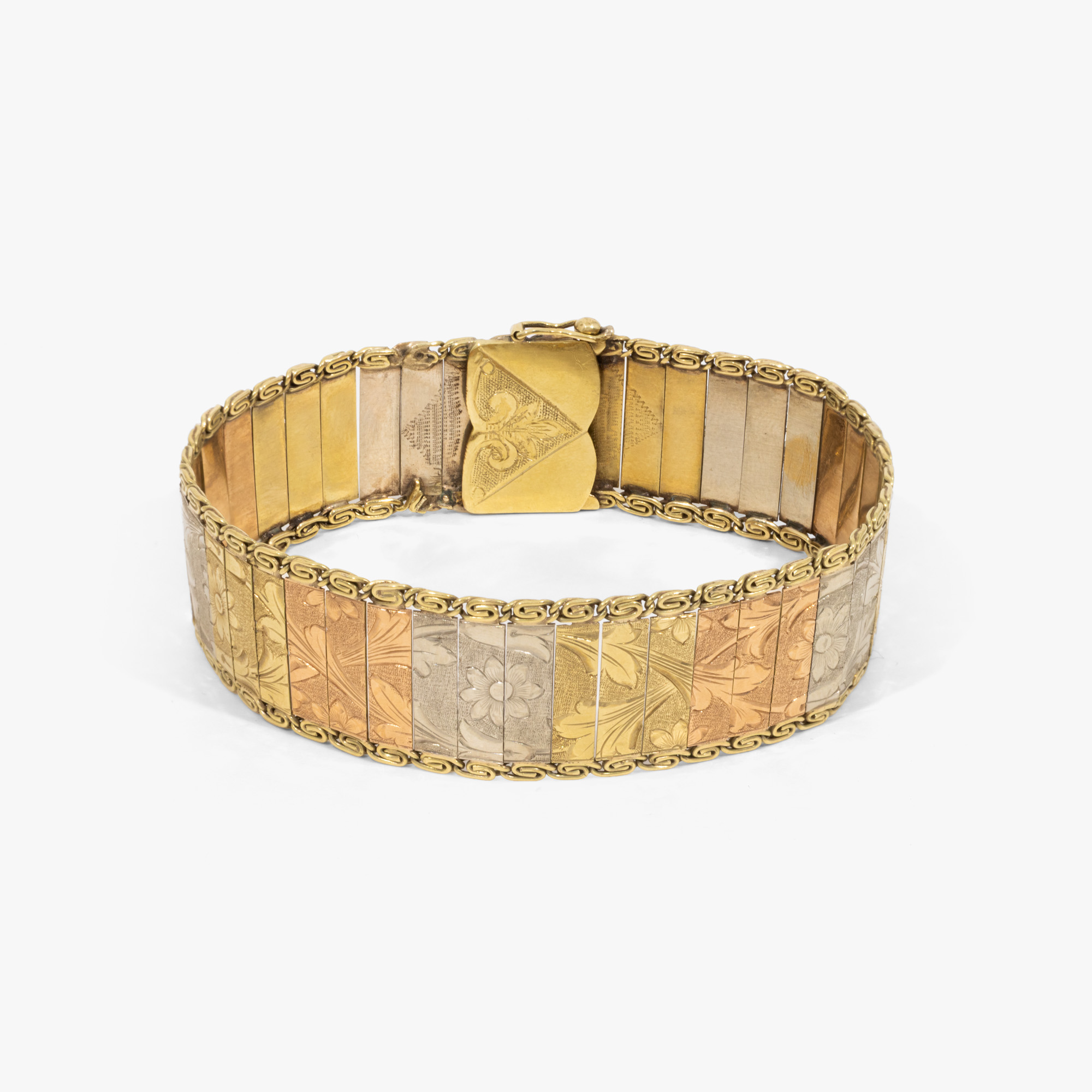 Massive tricolor gold bracelet, decorated with floral-vegetal motifs