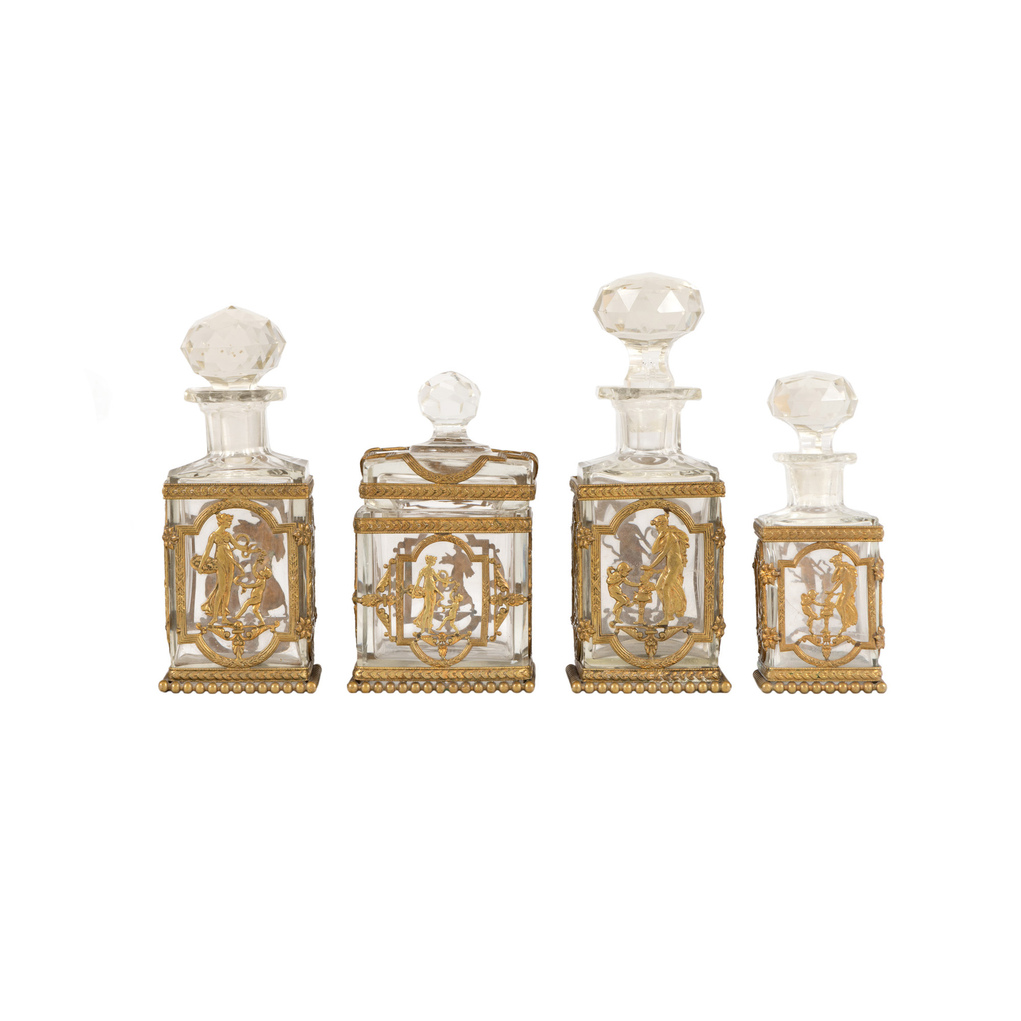 Baccarat style toilet set, consisting of four crystal and gilded bronze bottles, end of the 19th century