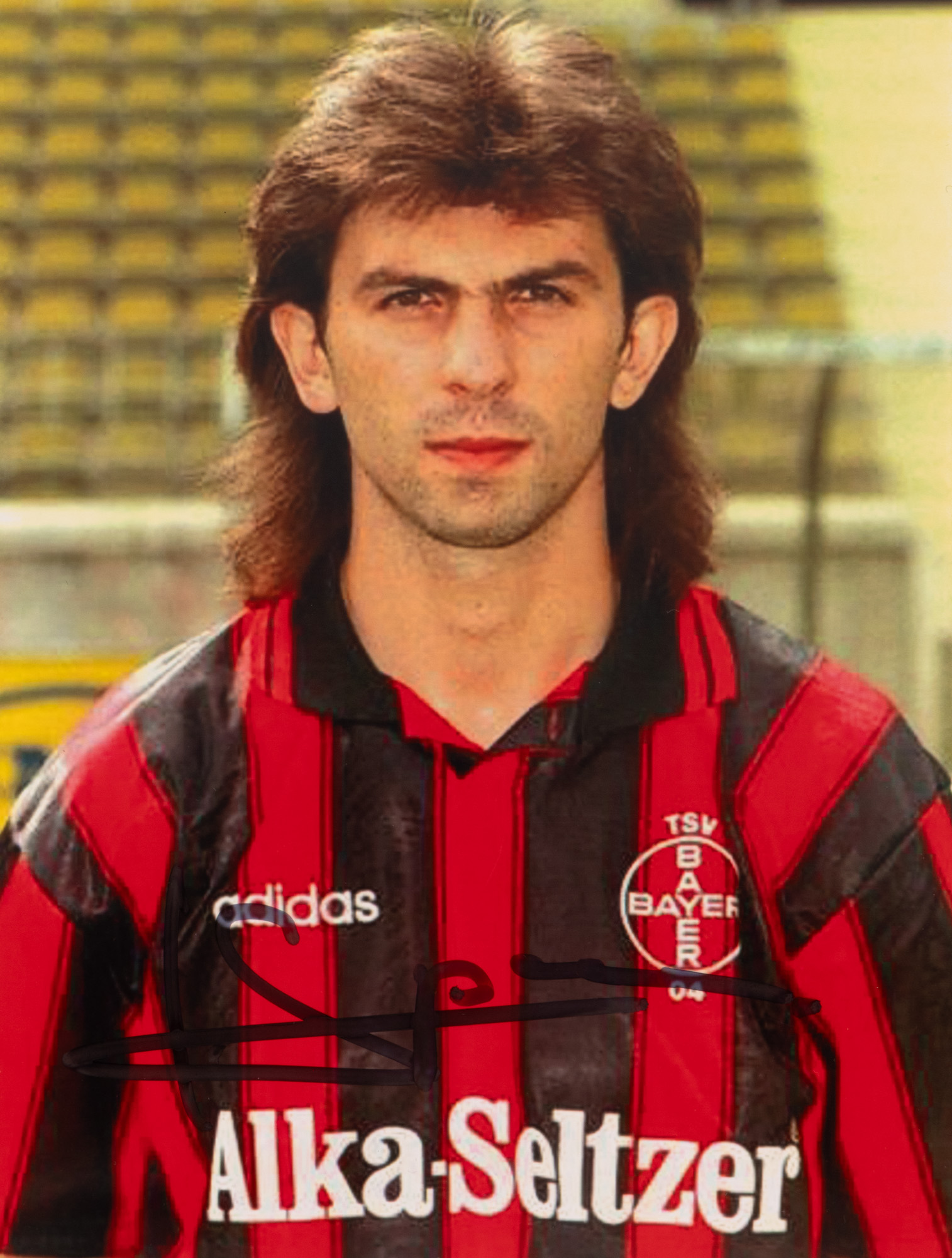 Photograph of Ionuț Lupescu, in Bayer Leverkusen gear, with the athlete's holograph signature, framed
