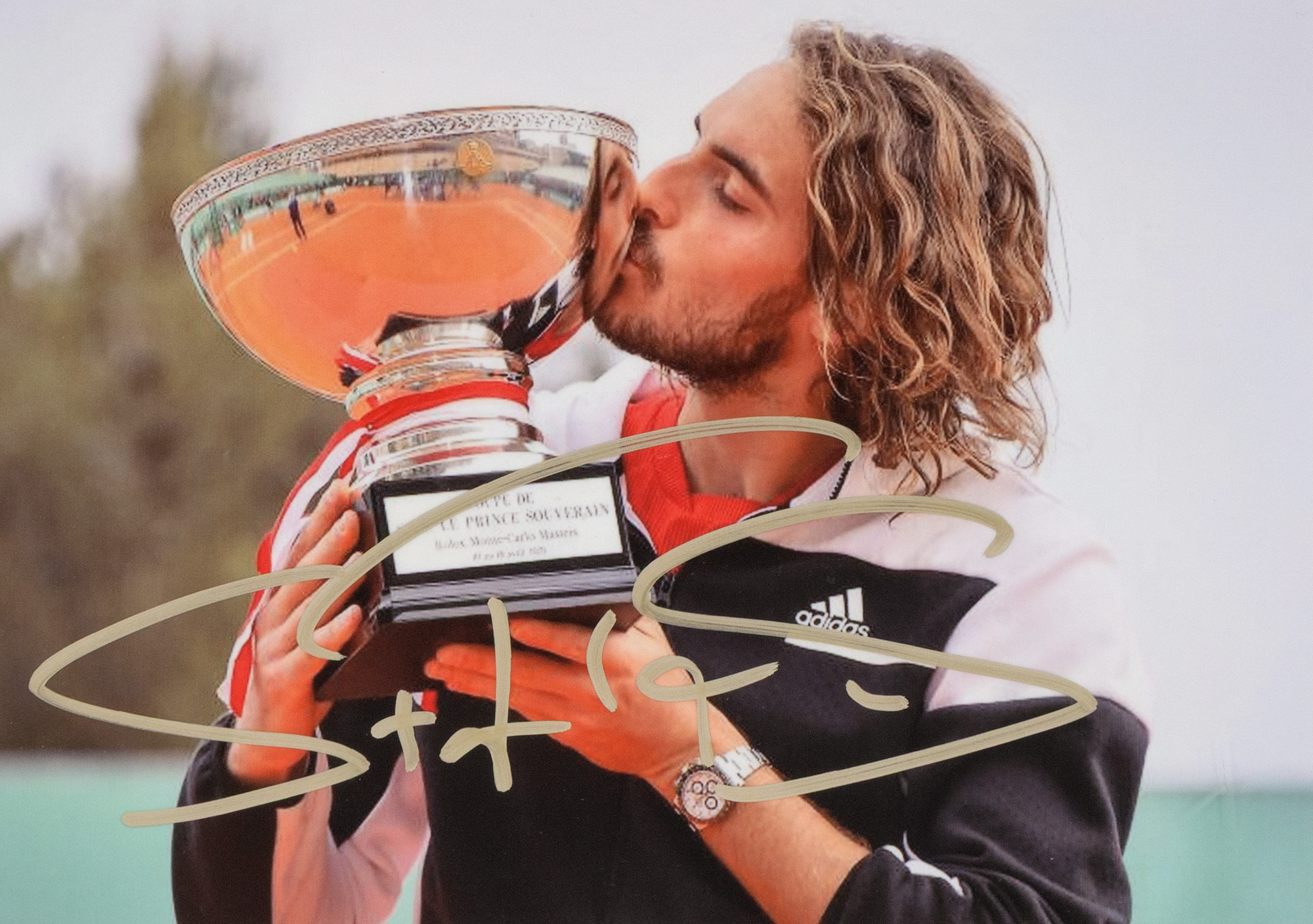 Photograph of Stefanos Tsitsipas, with his holograph signature, framed
