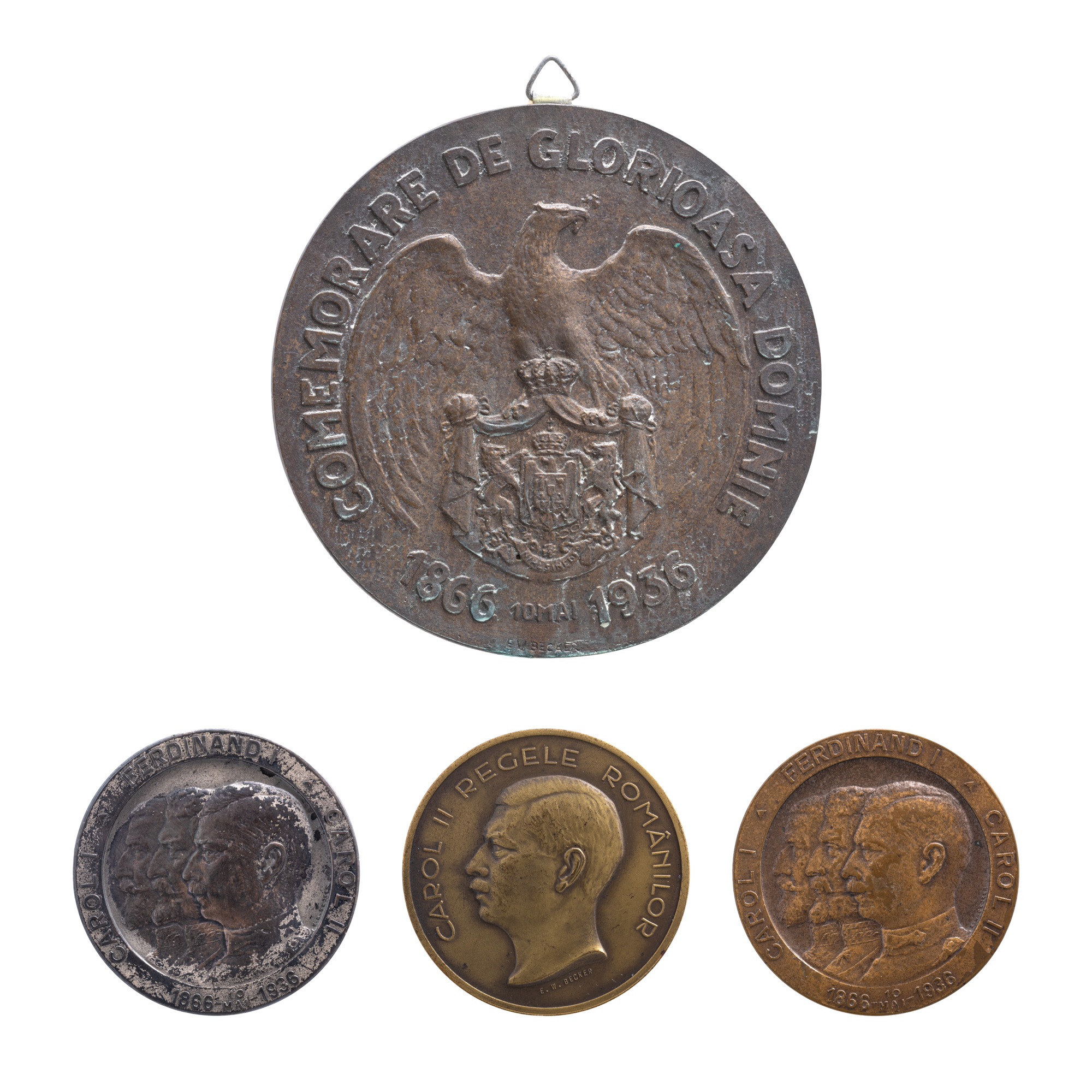 Lot format din machetă originală ”Comemorare de glorioasă domnie, 10 mai 1866 - 10 mai 1936”, gravor Emil Wilhelm Becker, 1936, revers, exemplar unic, două medalii ”Carol I. Ferdinand I. Carol II, Comemorarea glorioasei domnii, 10 mai 1866 - 10 mai 1936”, gravor Emil Wilhelm Becker, 1936, medalie ”Carol II Regele Românilor, Comemorarea glorioasei domnii, 10 mai 1936”, gravor Emil Wilhelm Becker, 1936 