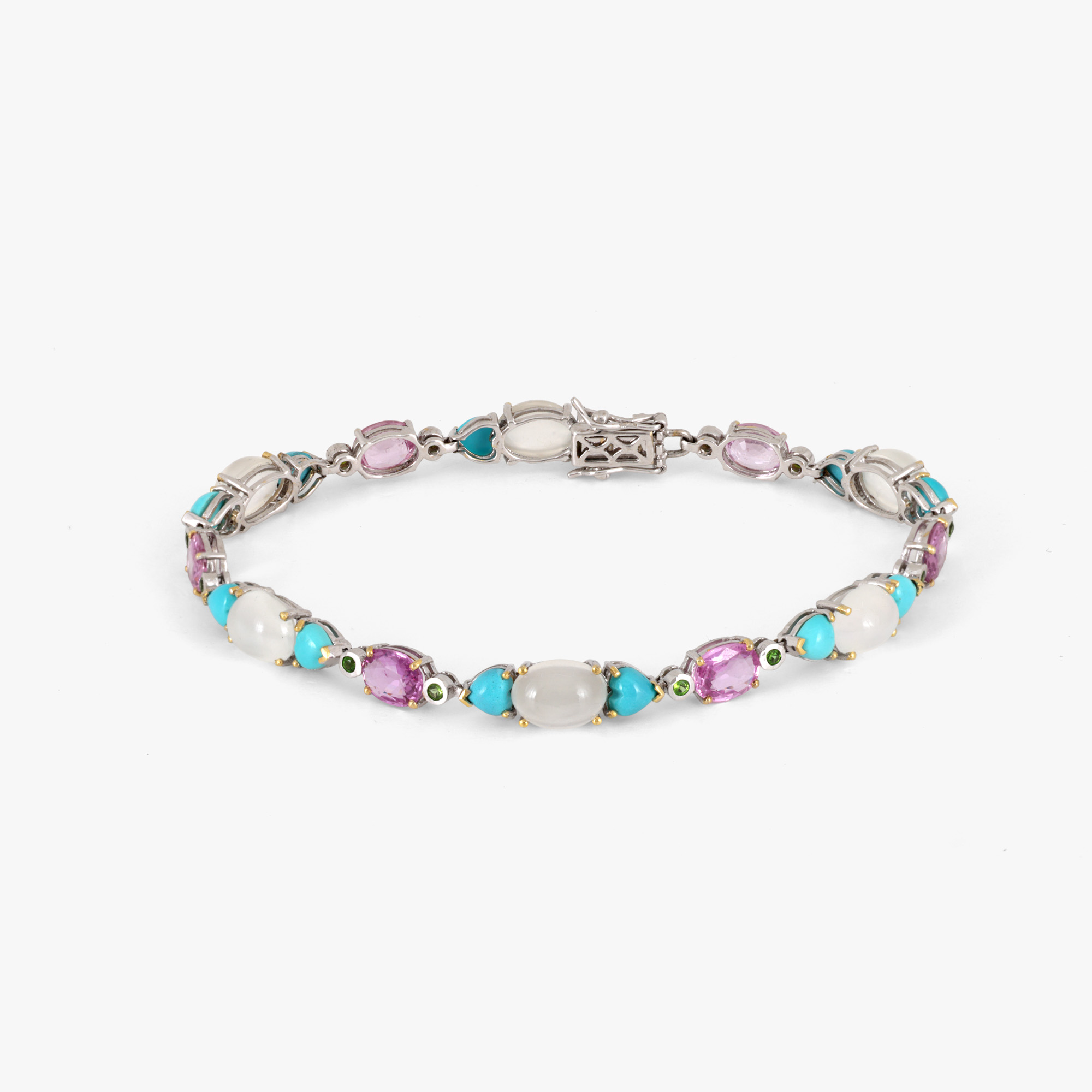 White gold bracelet, decorated with turquoise, opals, peridots, and sapphires