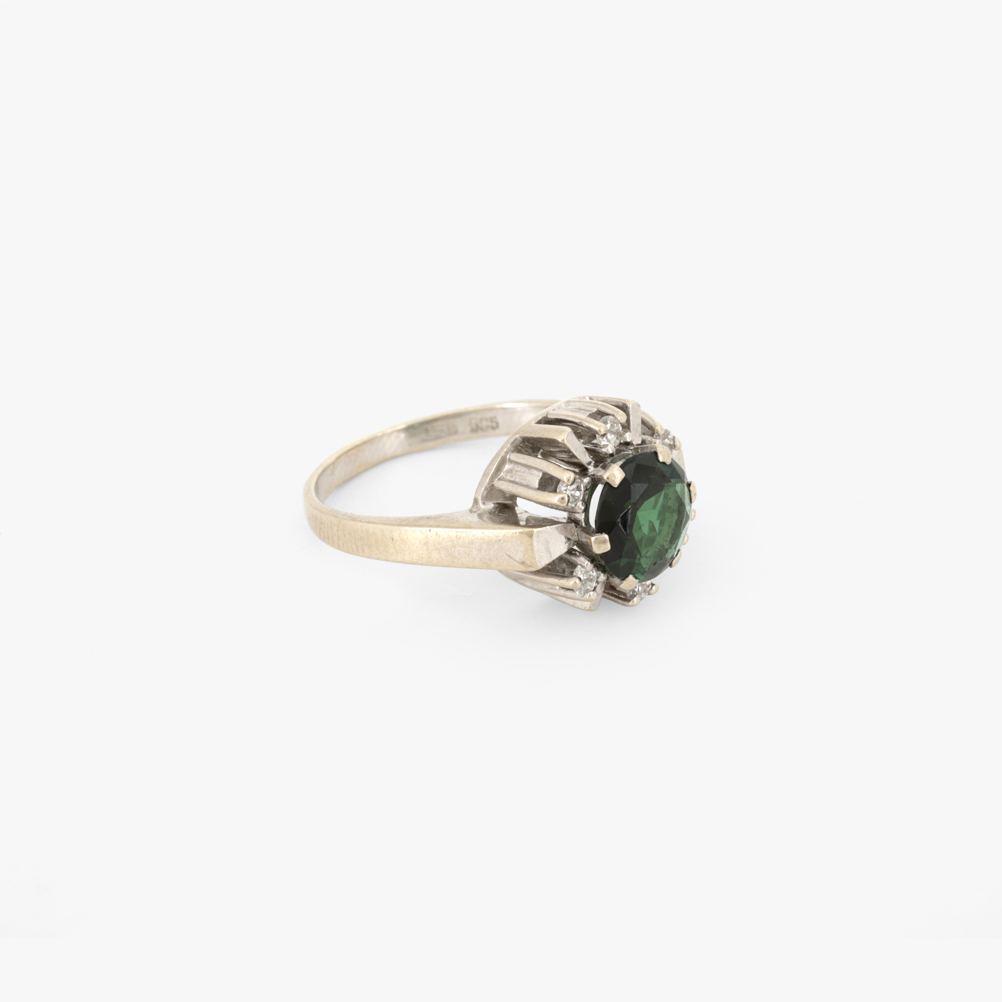 White gold ring, decorated with central tourmaline, surrounded by diamonds