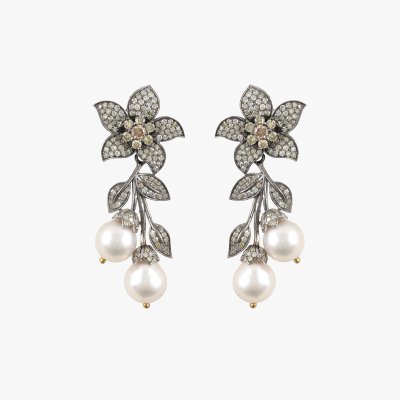 Pair of silver earrings, decorated with fancy diamonds and pearls