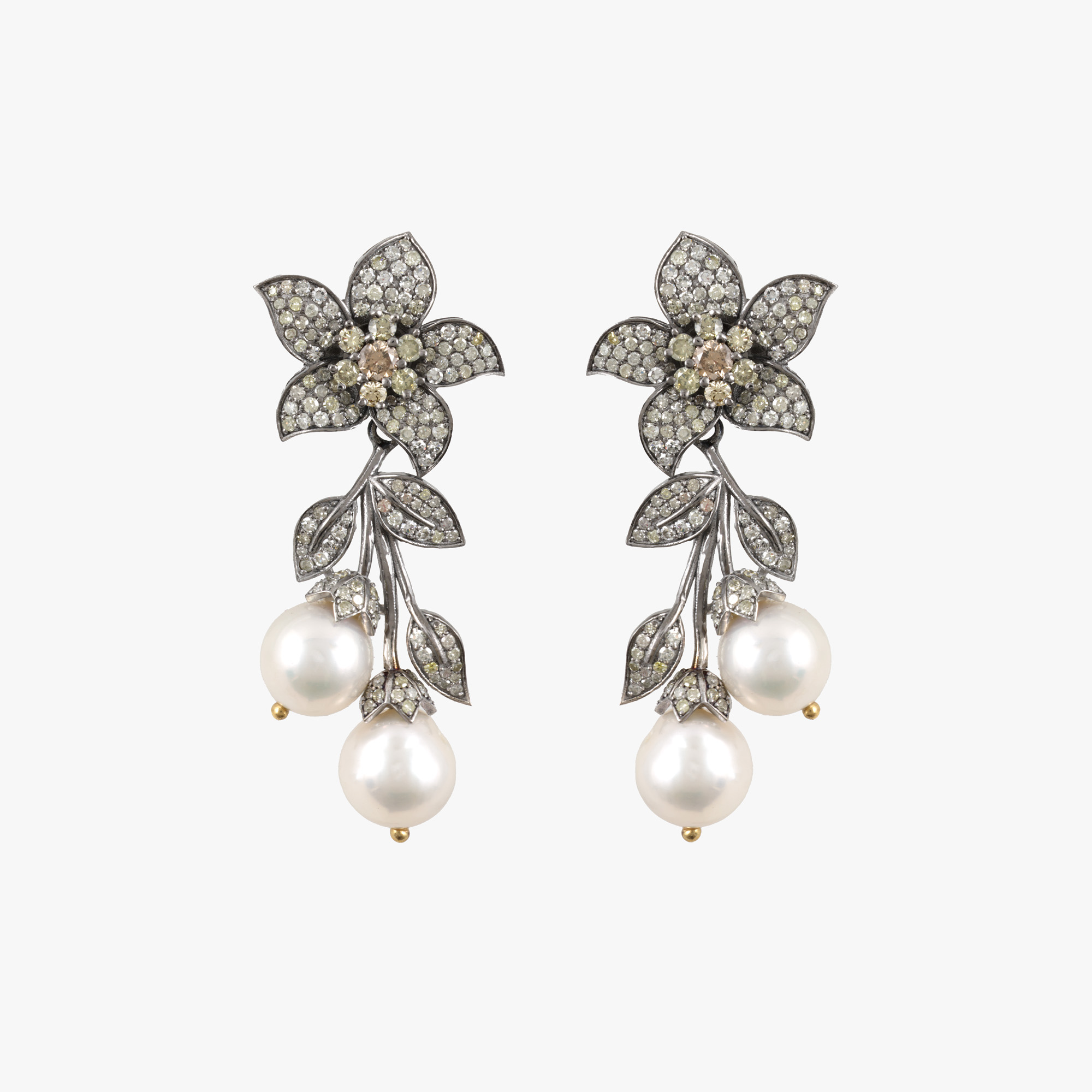 Pair of silver earrings, decorated with fancy diamonds and pearls