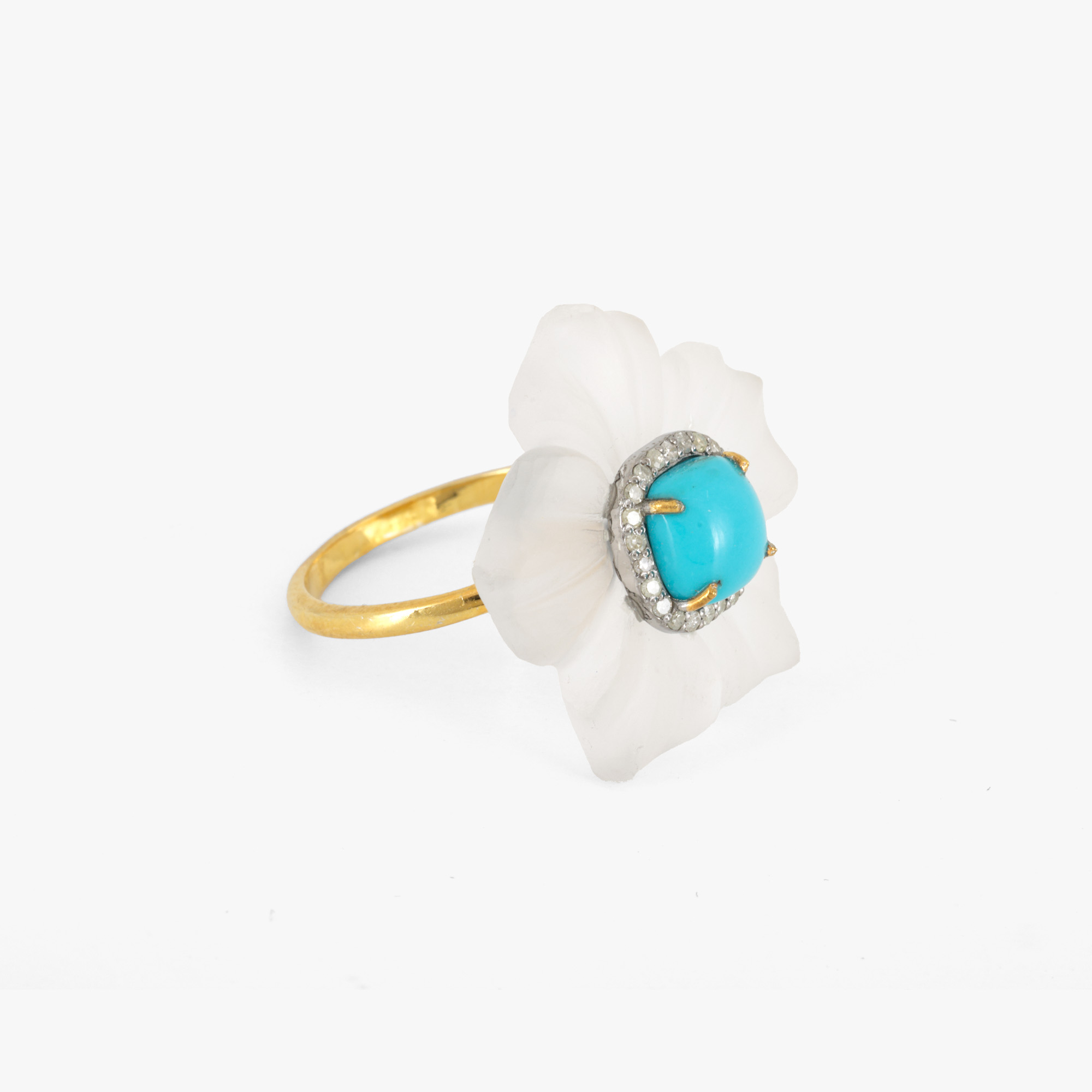Partially gilded silver ring, decorated with a carved quartz, turquoise and diamonds