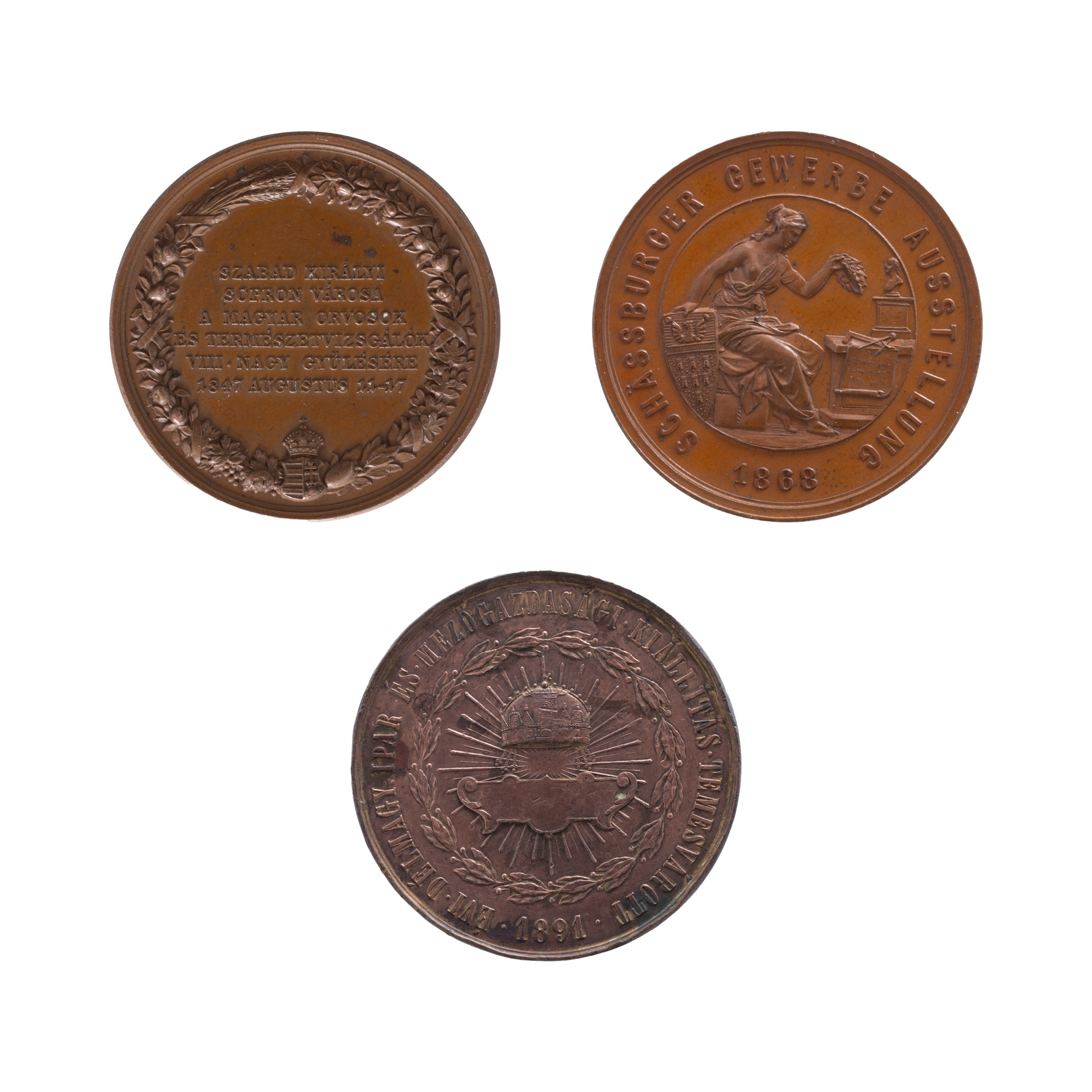Lot format din medalie ”Erdem Erem - Pentru asociația expoziției industriale și agricole maghiare”, gravor Piffl A., 1891, medalie ”Expoziția meșteșugărească din Sighișoara”, gravor Joseph Tautenhayn, 1868 și medalie ”Cea de-a VIII-a Mare Adunare a Medicilor și Naturaliștilor Maghiari”, gravor Iosef Daniel Boechm., cca. 1847