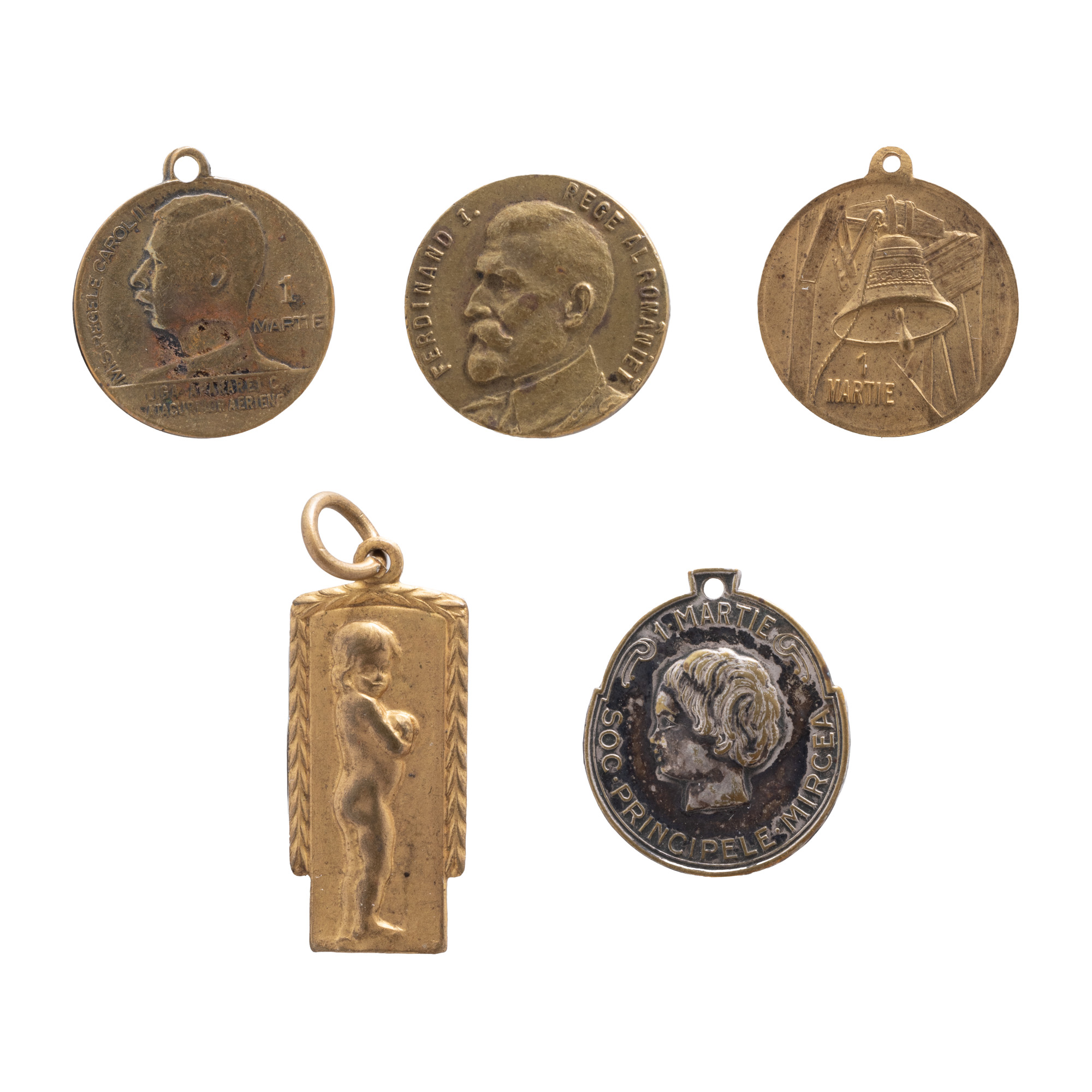 Lot consisting of "Carol II - League of Defense against Air Attacks" badge, three "Prince Mircea Society" badges, and "Ferdinand I, King of Romania" badge