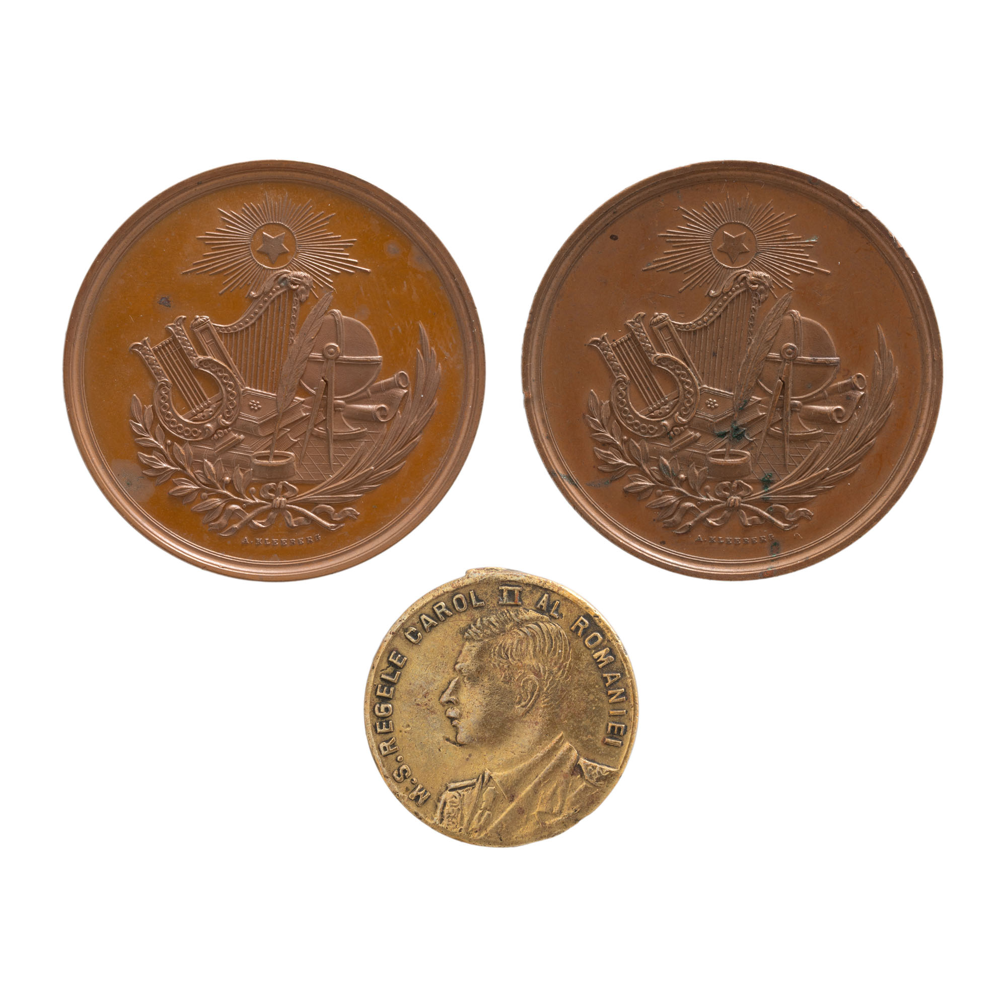 Lot consisting of "Third Prize - Ministry of Instruction" medal, circa. 1933, and two "For merit at the general contest of the year" medals, engraver A. Kleeberg.