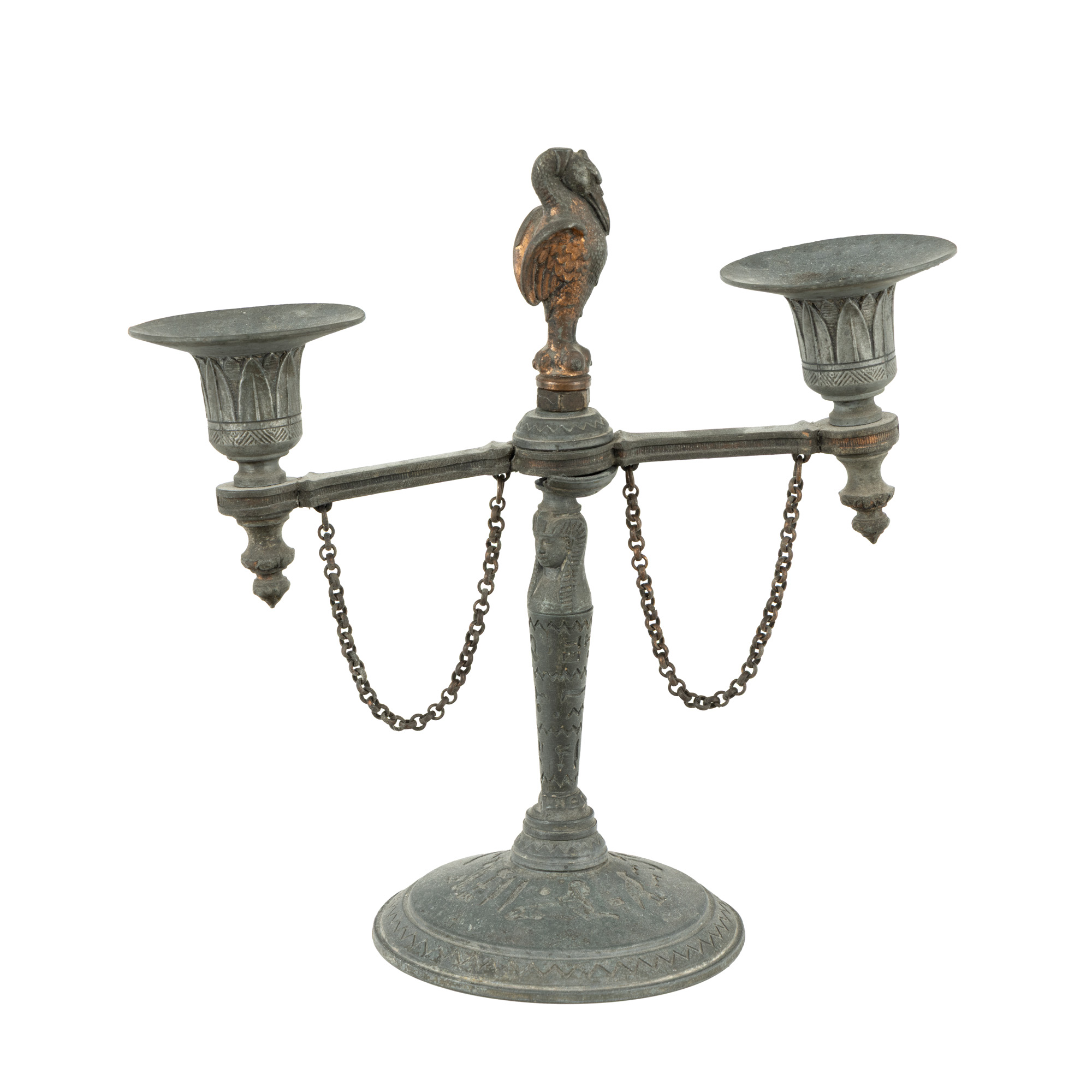 Miniature candelabrum, decorated with Egyptian motifs, adorned the house of sculptor Emil Wilhelm Becker.