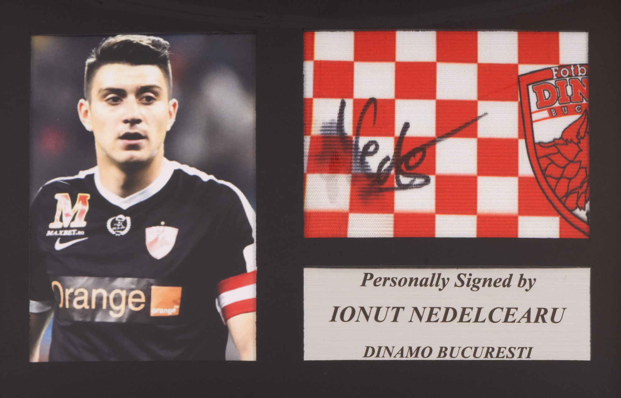 Captain's Armband, F.C. Dinamo, with Ionuț Nedelcearu's holographic signature, framed