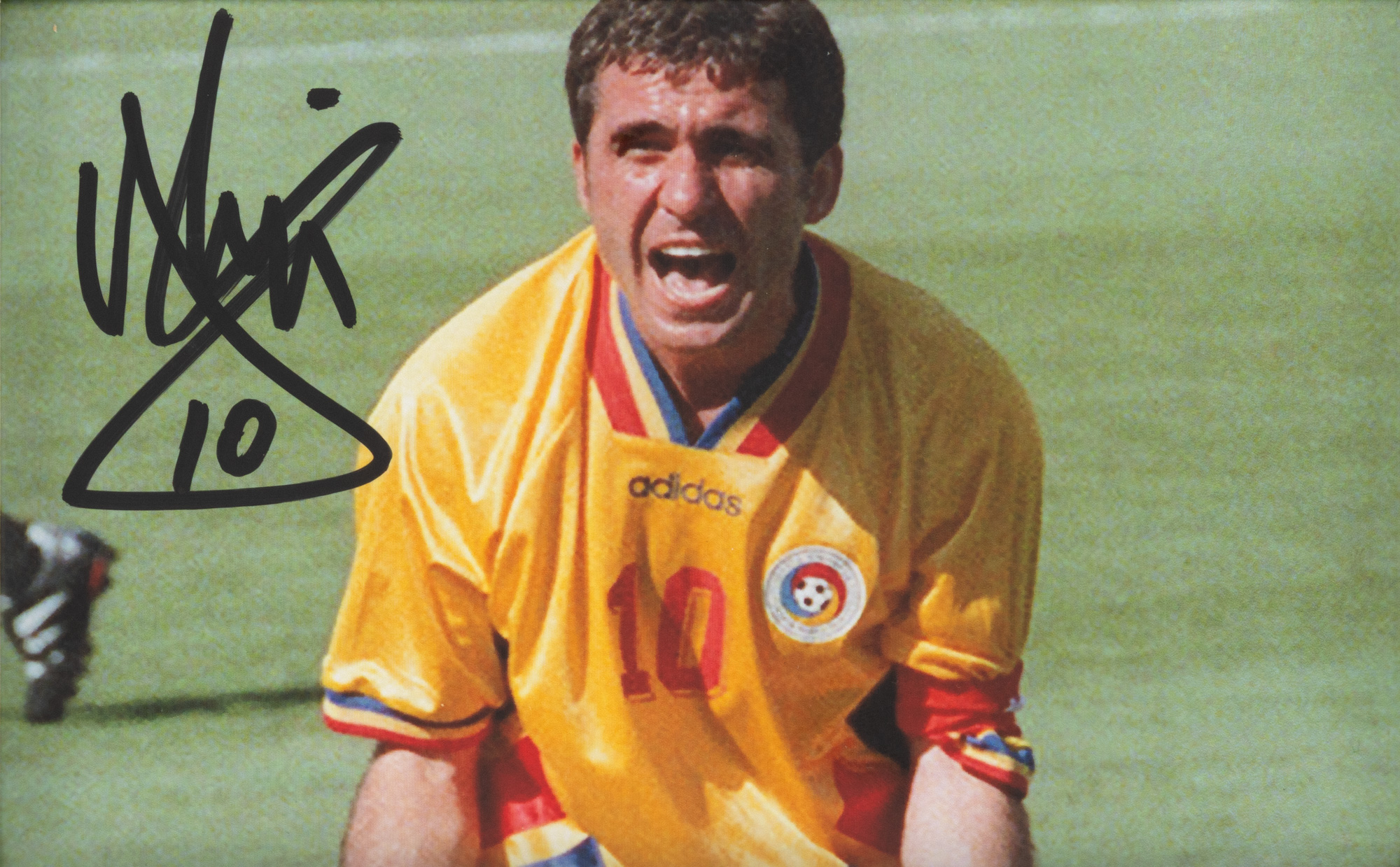 Photograph of Gheorghe Hagi, with his holograph signature, framed