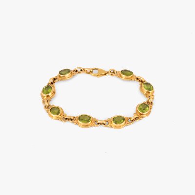 Gold bracelet, decorated with peridots