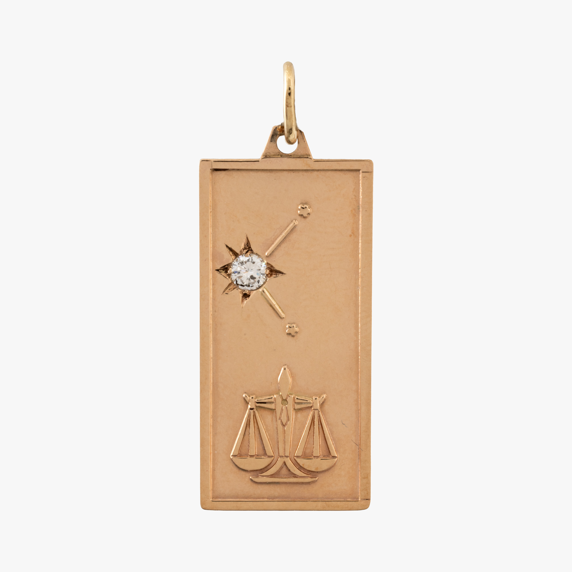 Gold pendant, decorated with a zodiac sign and a diamond