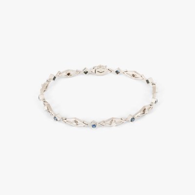 White gold bracelet, decorated with alternating diamonds and sapphires, accompanied by an additional gemological certificate