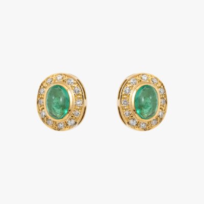 Pair of Carl F. Bucherer gold clip earrings, decorated with emeralds and diamonds