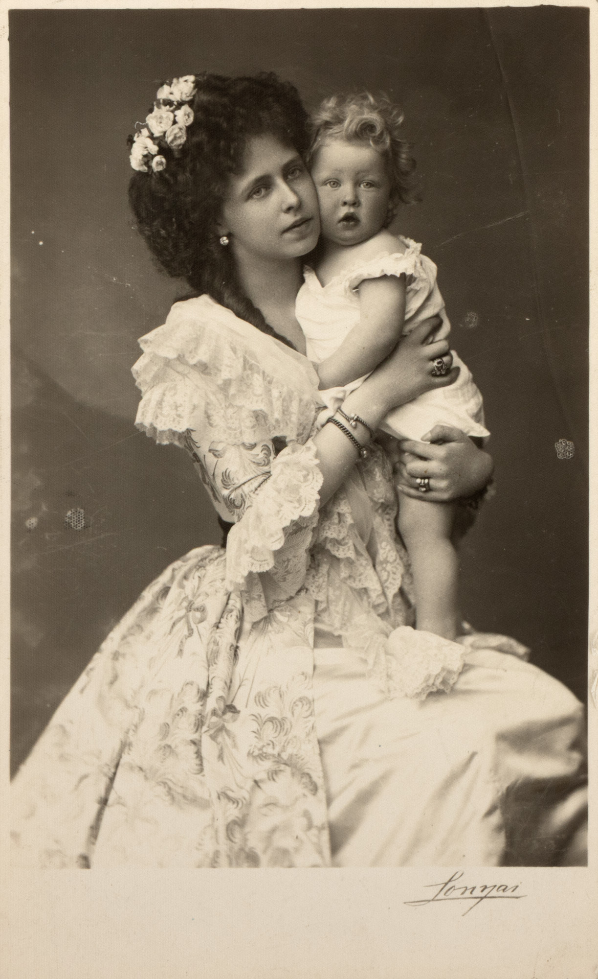 Photograph depicting Princess Maria, with her first child, the future King Carol II, photographed by Lonyai studio, Bucharest, cca. 1923, after an older cliché.
