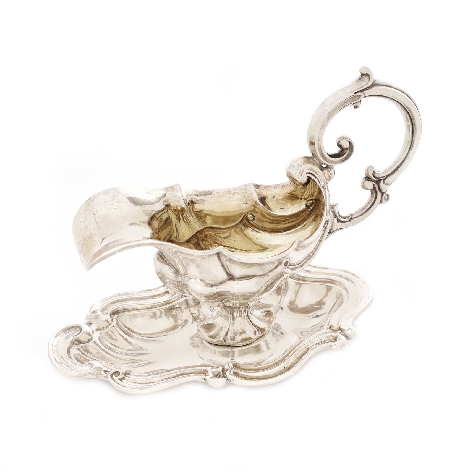 Silver gravy boat with a tray, approx. 1870