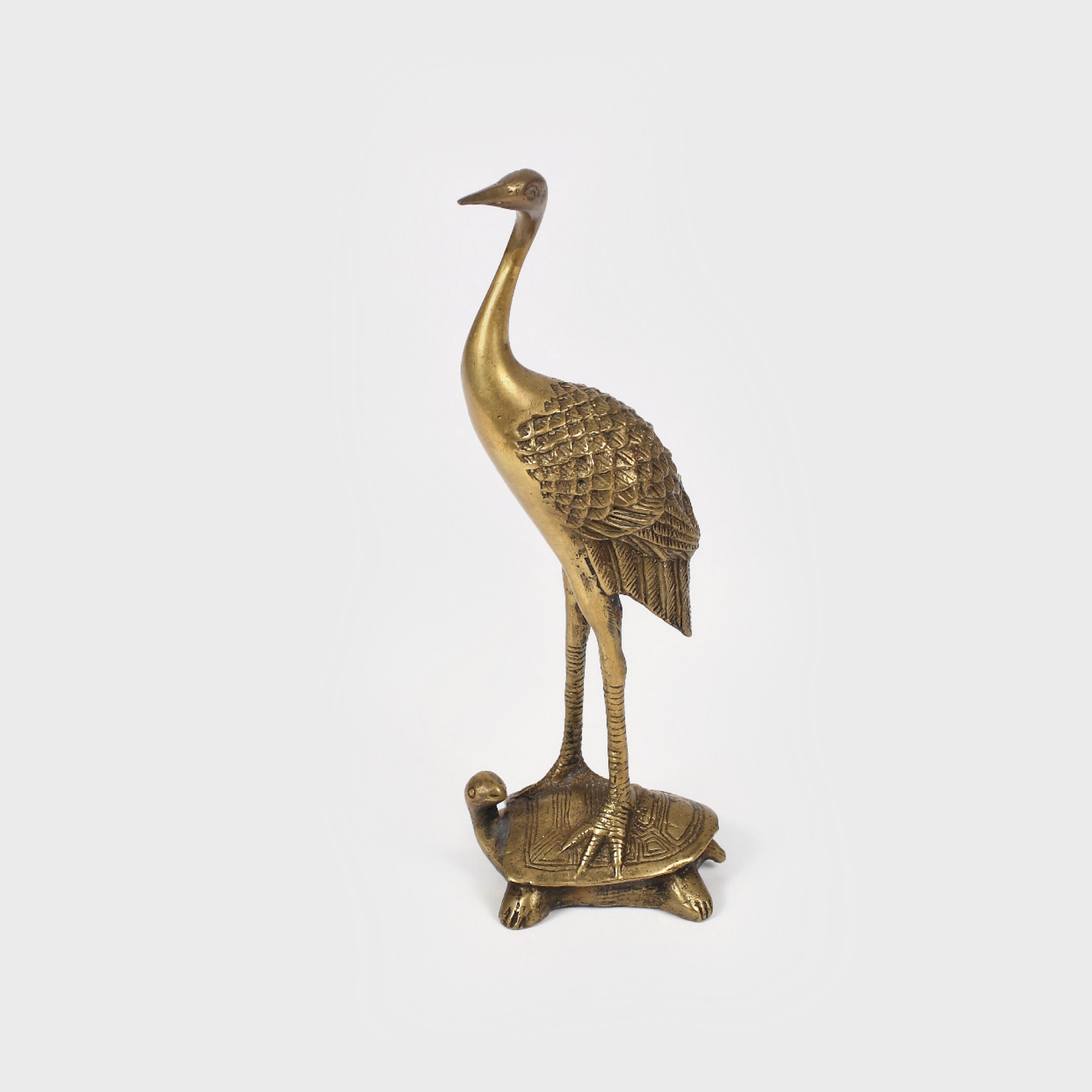 Statuetă decorativă din bronz, înfățișând cocor și broască țestoasă, ce simbolizează longevitatea