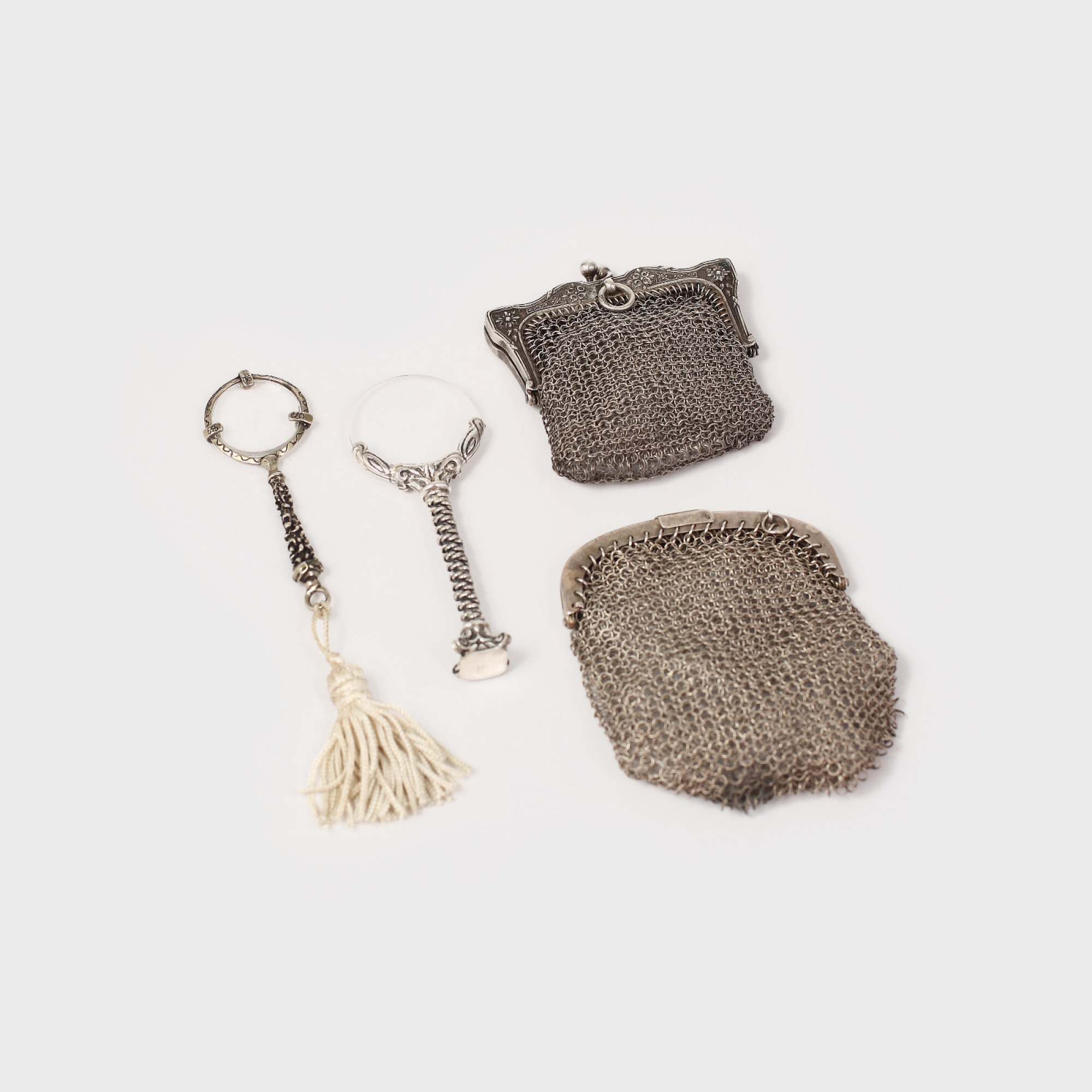 Lot de miniaturi alcătuit din două porte-monnaie și două lornioane, din argint