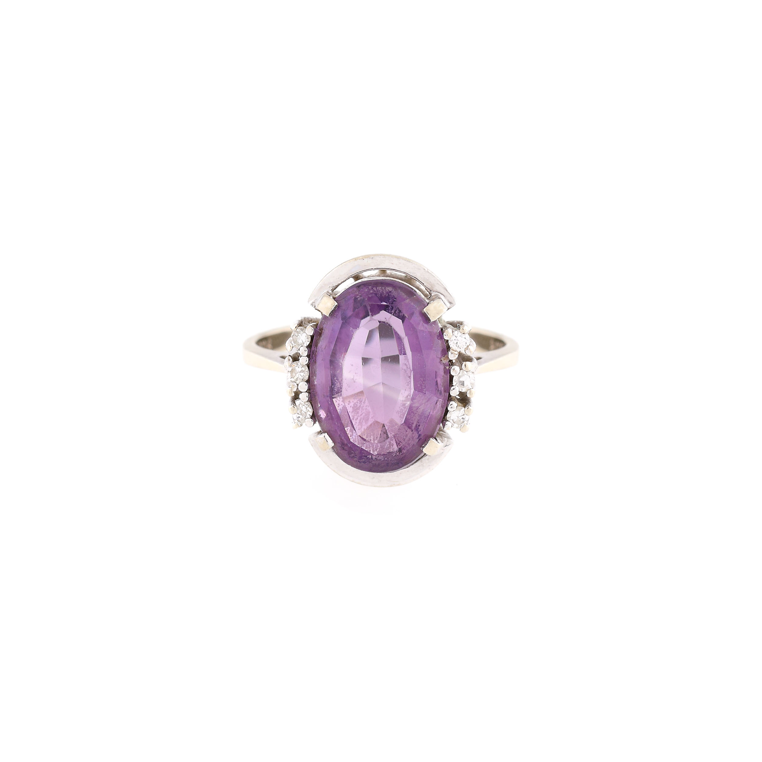 White gold ring, decorated with central amethyst and six diamonds