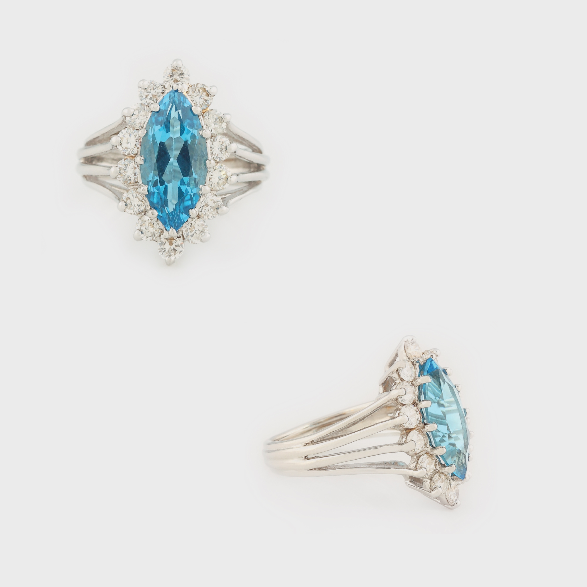 Inel din aur alb, decorat cu un topaz marquise anturat de diamante