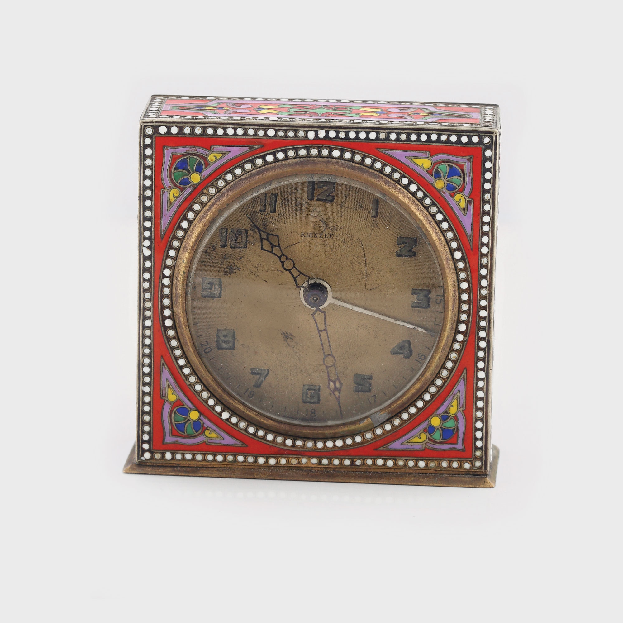 Ceas deşteptător Kienzee, având ornamentaţii în email, cca. 1930