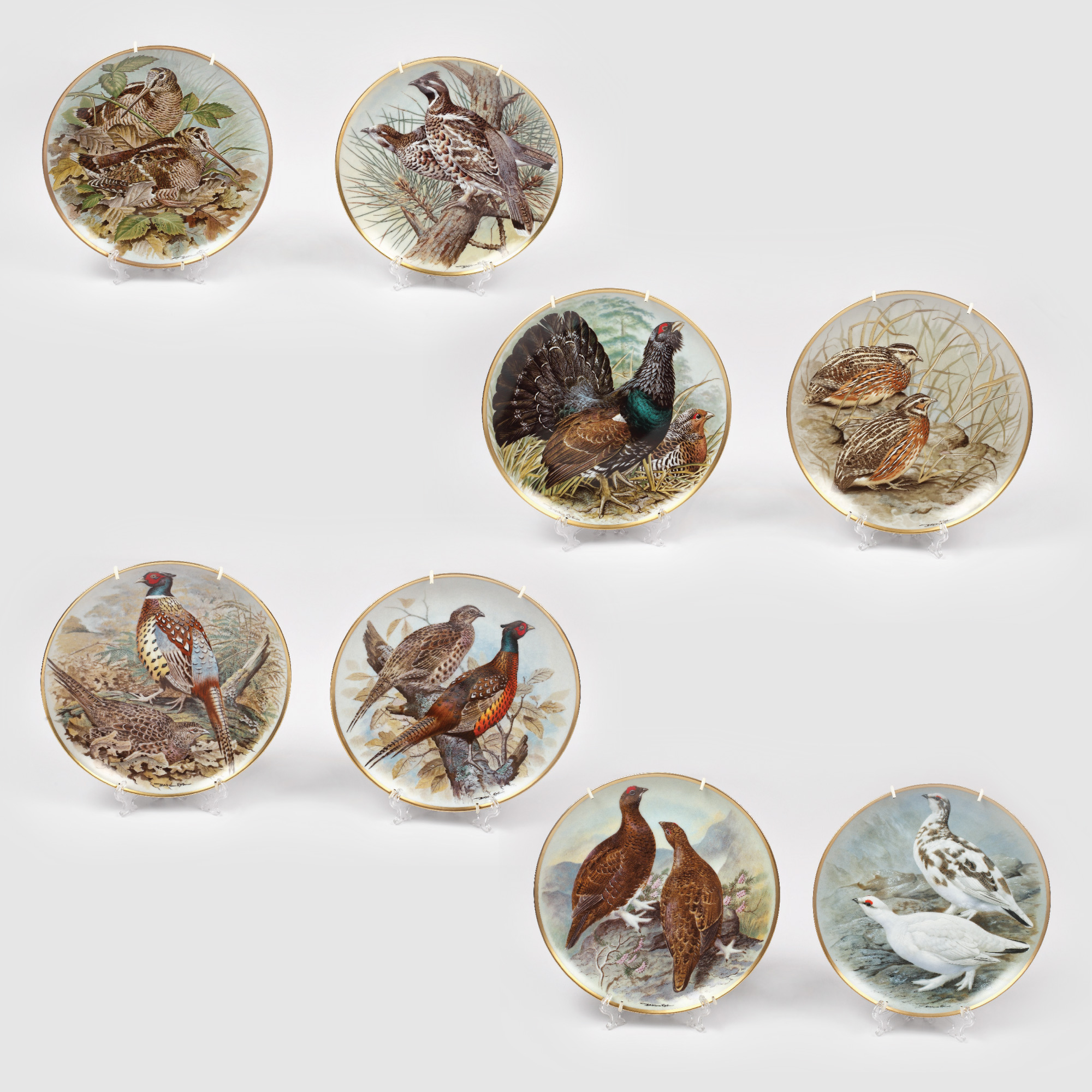 Set de farfurii din porţelan Limoges, ornate cu descrieri picturale ale vieţii sălbatice după pictorul naturalist englez Basil Ede