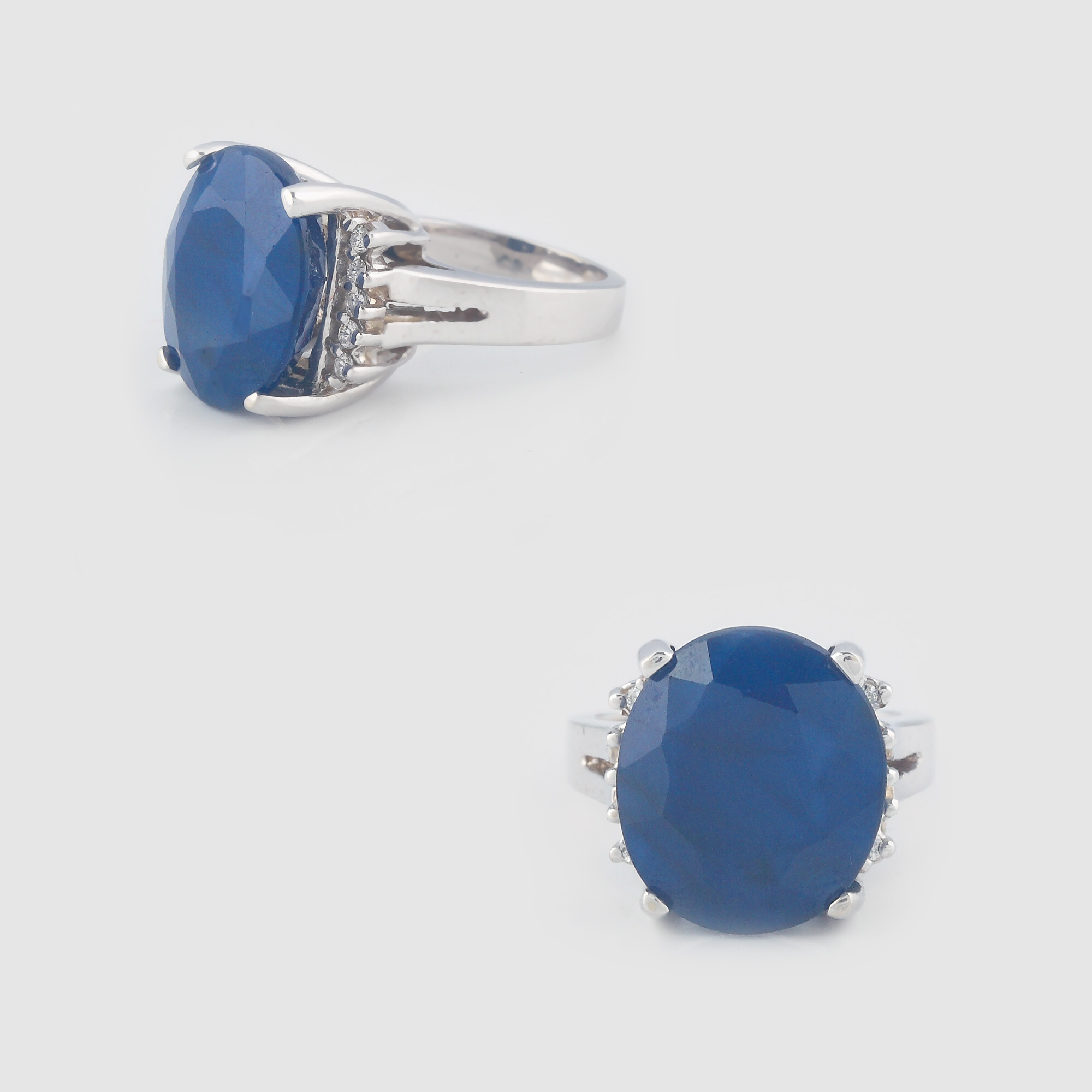Impunător inel din aur alb, decorat cu safir şi diamante