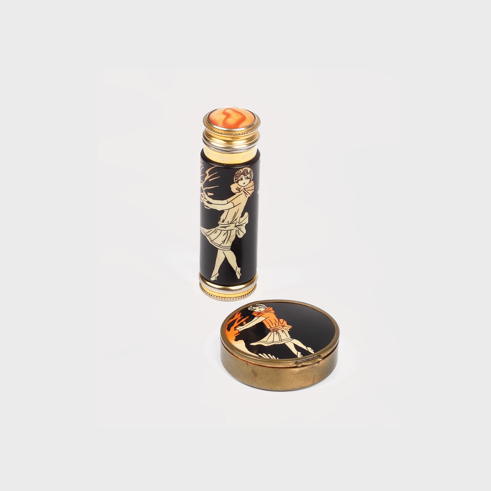 Lot Art Deco, format din cutiuţă pentru rouge à lèvres şi atomiseur pentru parfum, decorate cu personaje feminine în vestimentaţie specifică anilor '20, prima jumătate a sec. XX
