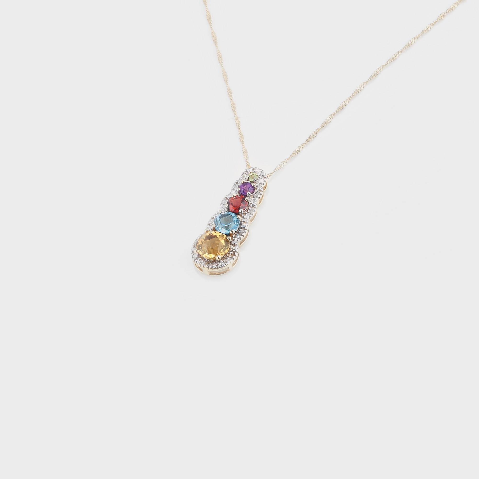 Pandantiv din aur, decorat cu mix multicolor de pietre preţioase şi diamante