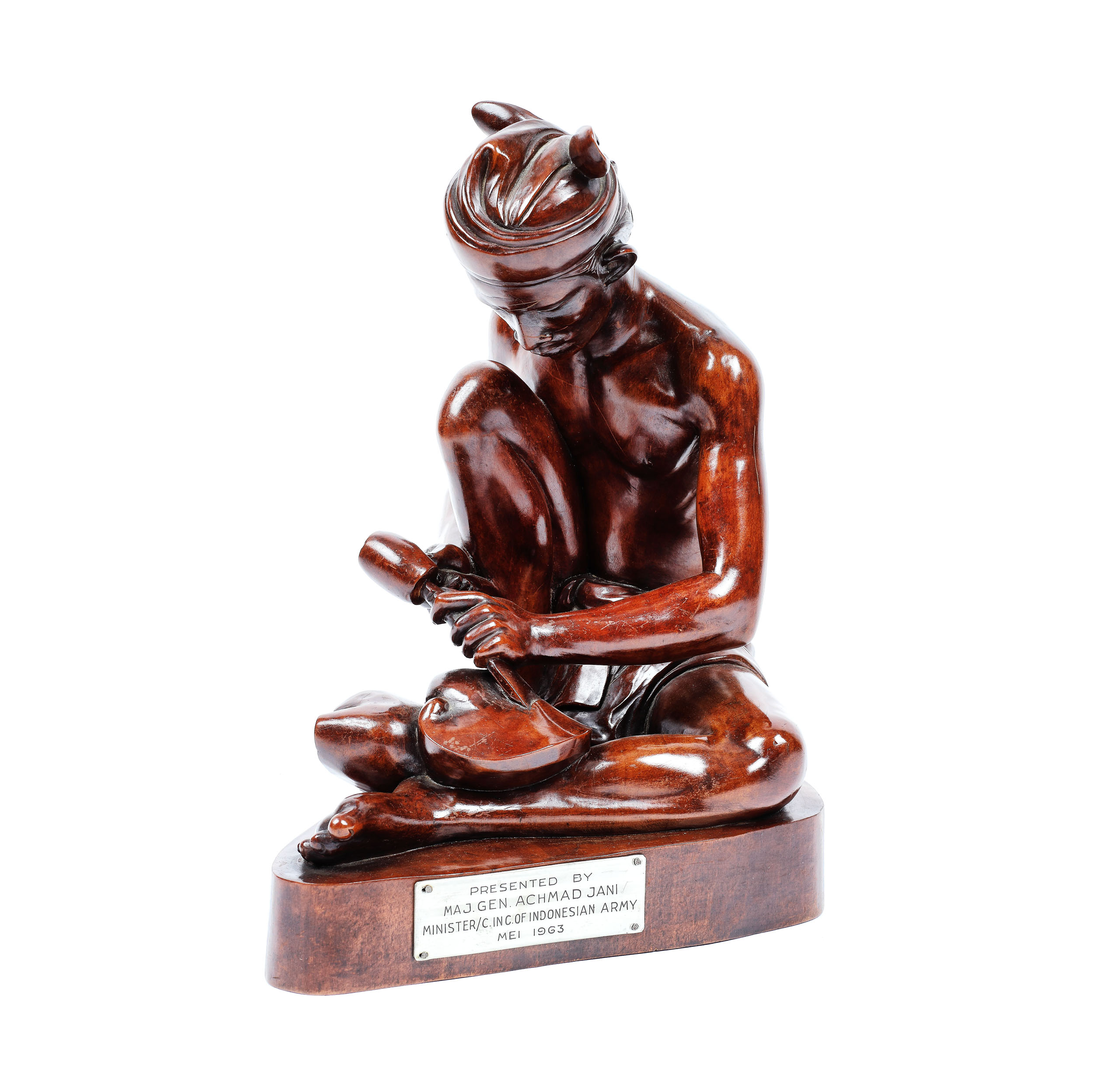 Mahogany statuette of a craftsman, a protocol gift from General Ahmad Yani to General Leontin Sălăjan, May 1963