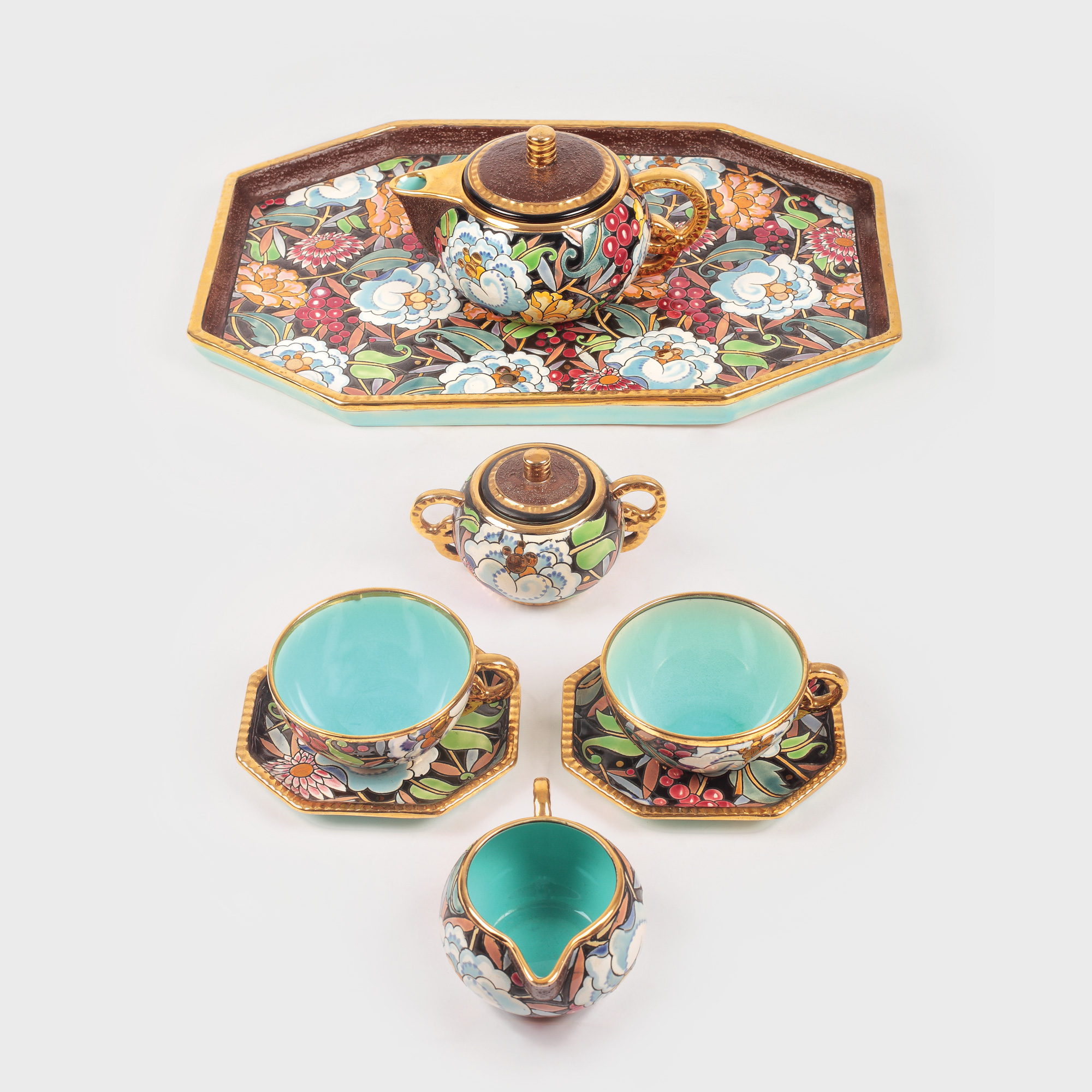 Serviciu de ceai tête-à-tête Boch Frères, stil Art Deco, design Charles Catteau, bogat pictat cu flori și nuferi, cca. 1930