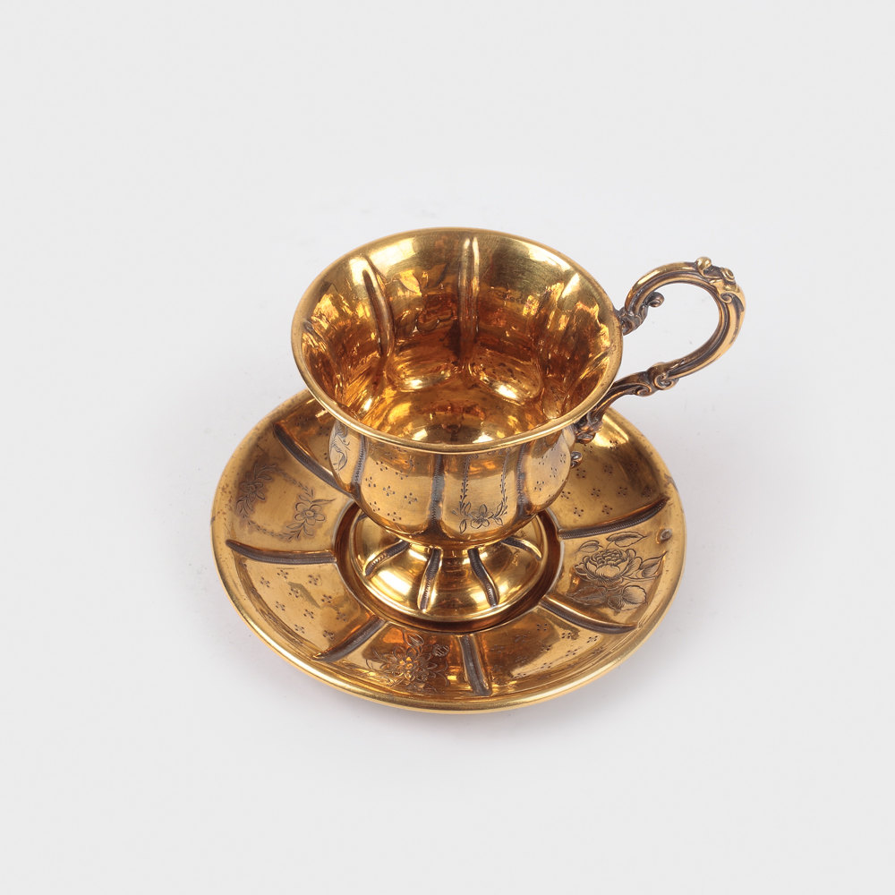 Căniţă cu farfurioară pentru cafea, din argint aurit, cu decor de inspiraţie barocă, de autor, sfârșitul sec. XIX
