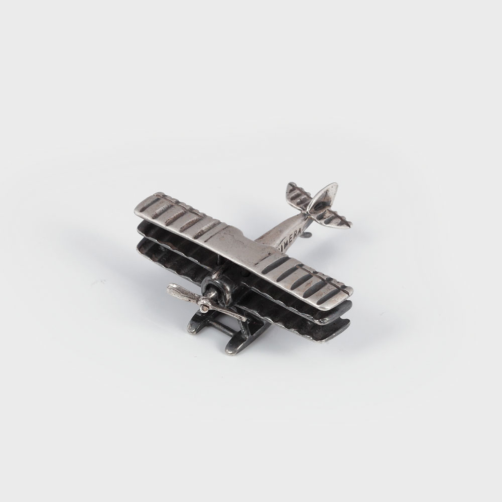 Avion de luptă miniatural din argint