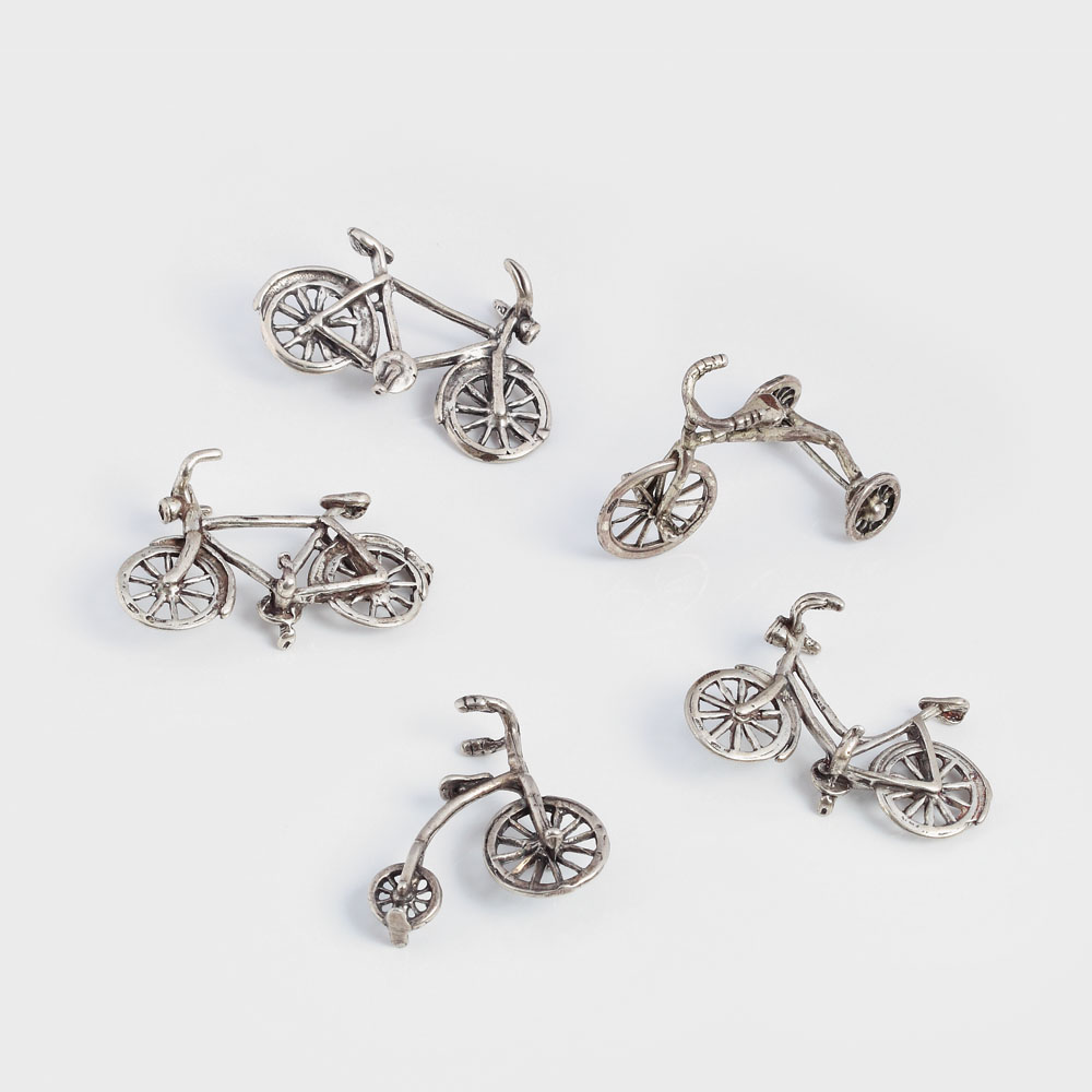 Colecţie de biciclete, monociclu și tricicletă miniaturale din argint