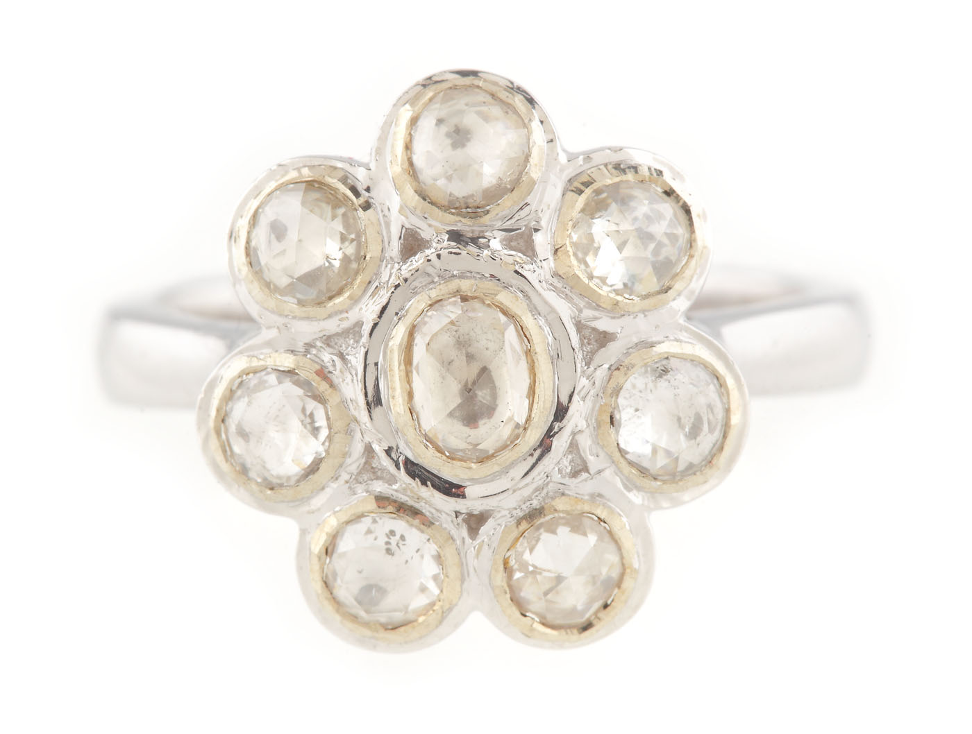 White gold ring, ornate with a diamond flower