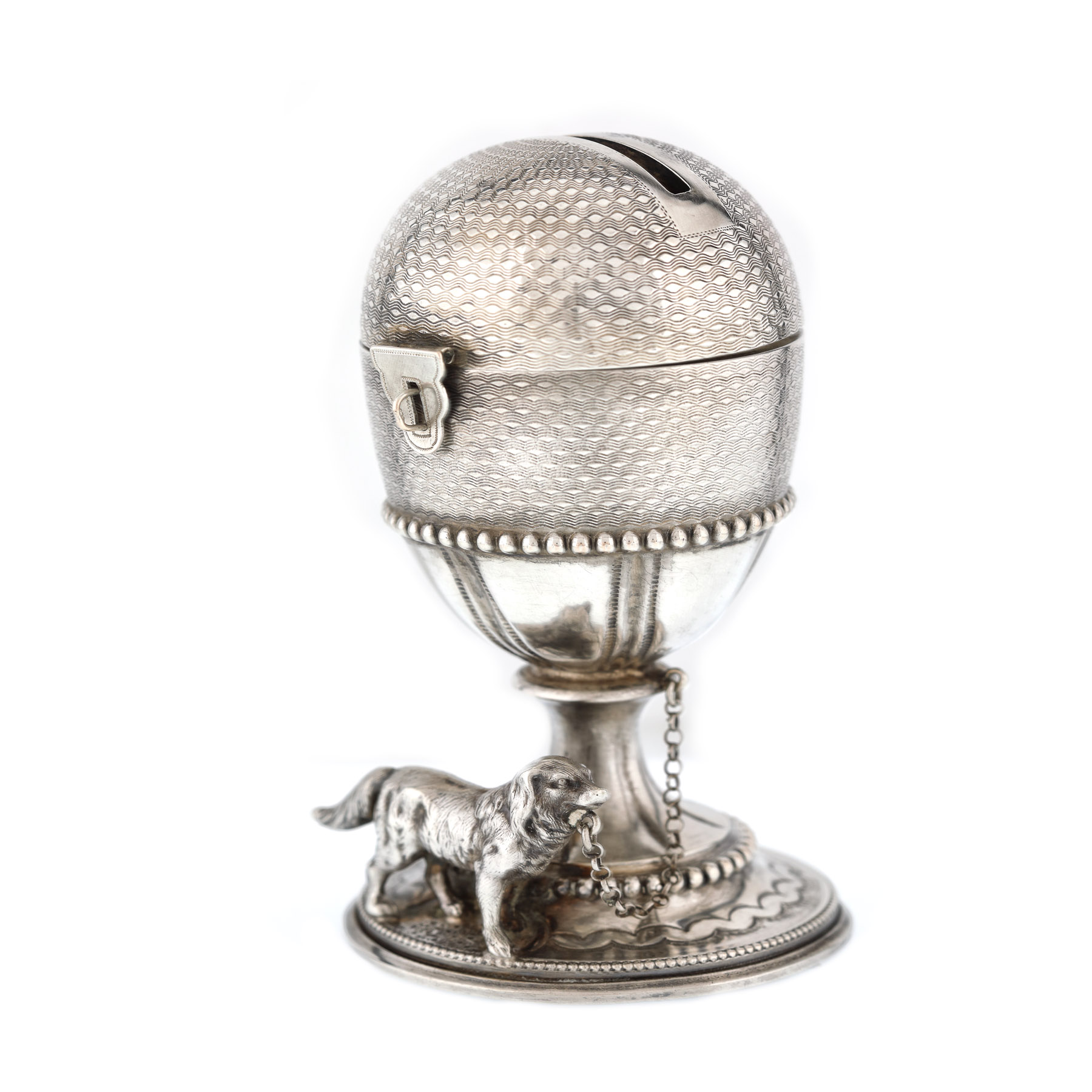 Cutie tzedakah din argint, de formă ovoidală, păzită de un câine, cca. 1900