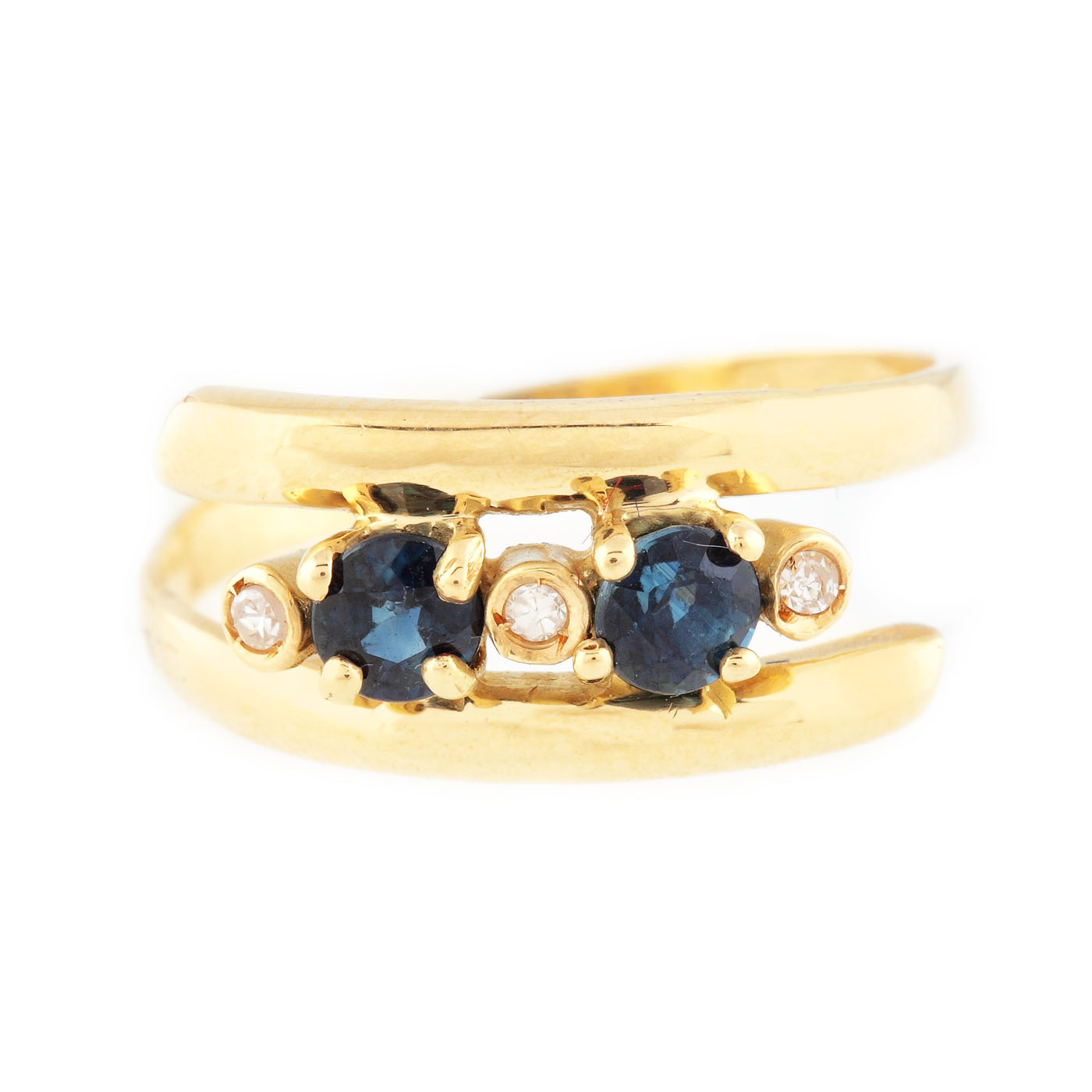 Gold ring decorated with sapphires and diamonds