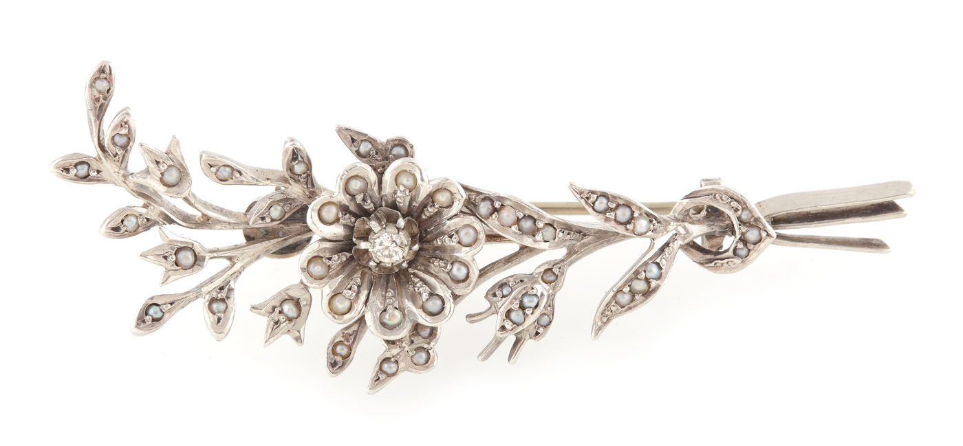 Art Nouveau silver brooch, decorated with diamond and pearls, ca. 1900