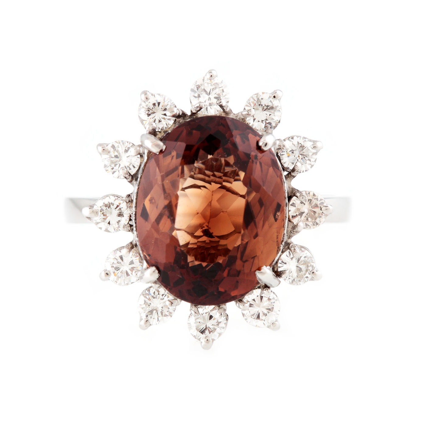 White gold ring, decorated with a topaz in a diamond entourage