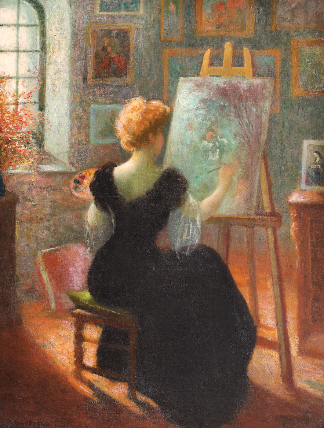 Artistă la șevalet