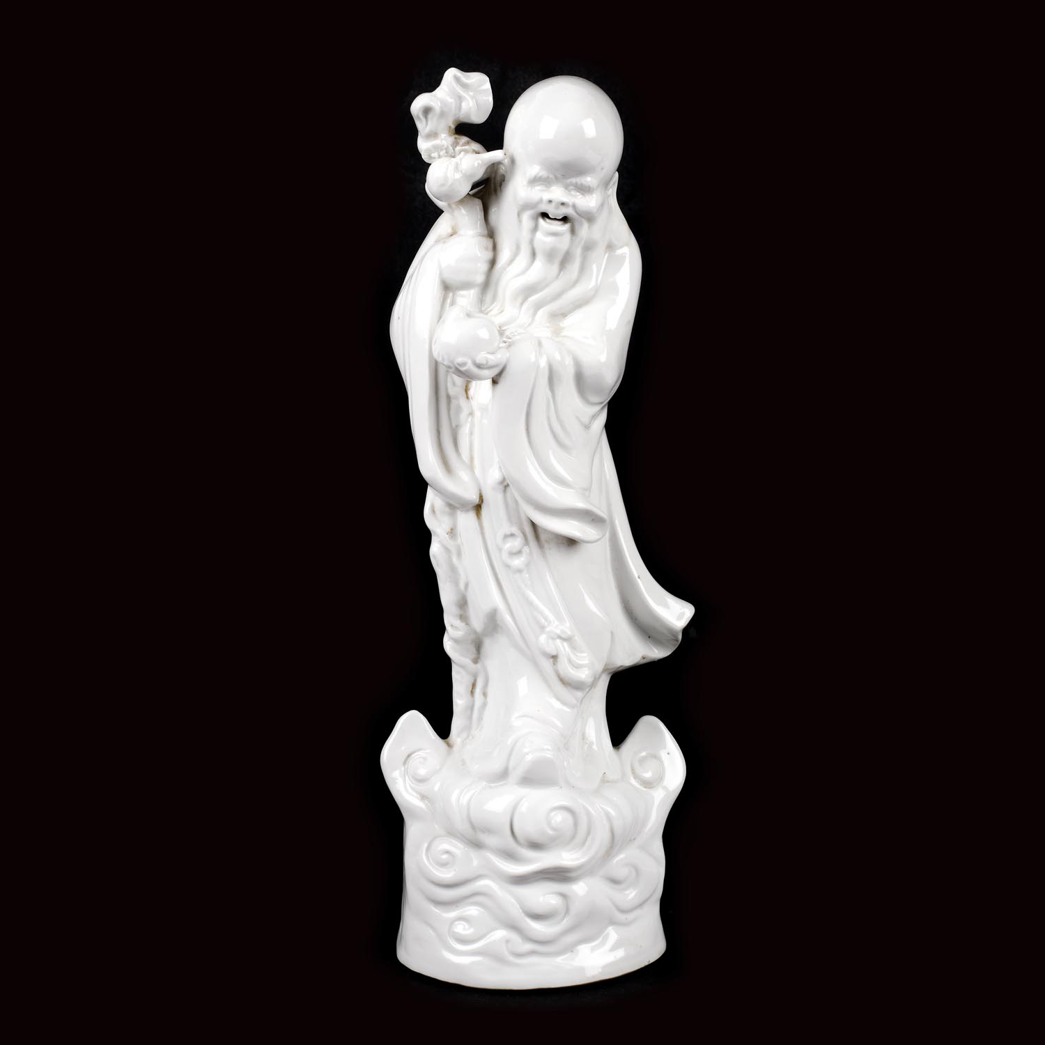 Statuetă din porțelan ”blanc de Chine”, reprezentându-l pe zeul longevității Shoulao, manufactura Dehua, sfârșitul dinastiei Qing, China, începutul sec XX